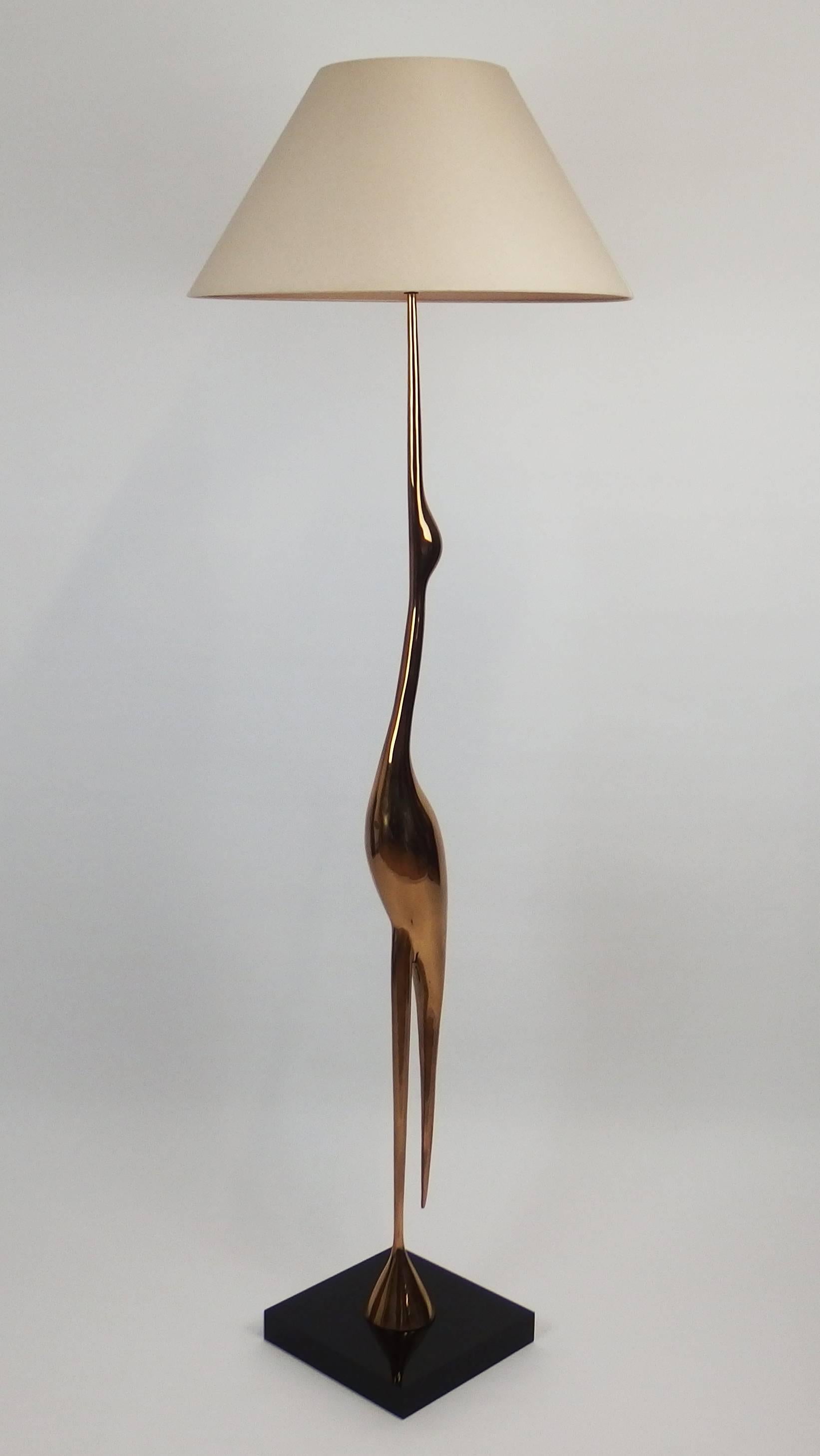 A gilt polished bronze floor lamp modelled as a stylized heron by René Broissand on a square plexiglass base.
Signed: R Broissand Santangelo
Height with the shade:73.75in.