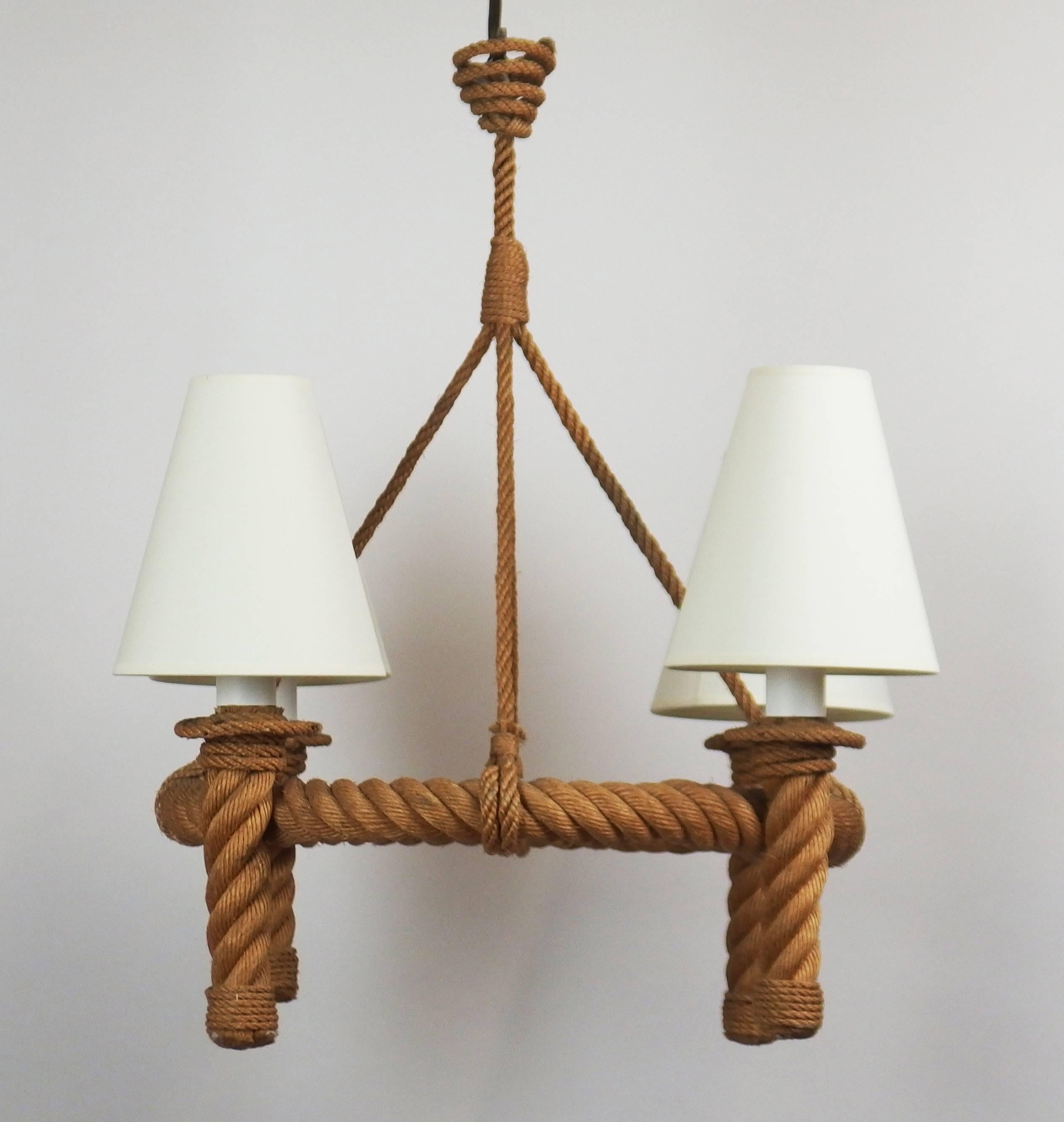 A four-light rope chandelier by Audoux Minet rewired with small screw sockets.
 