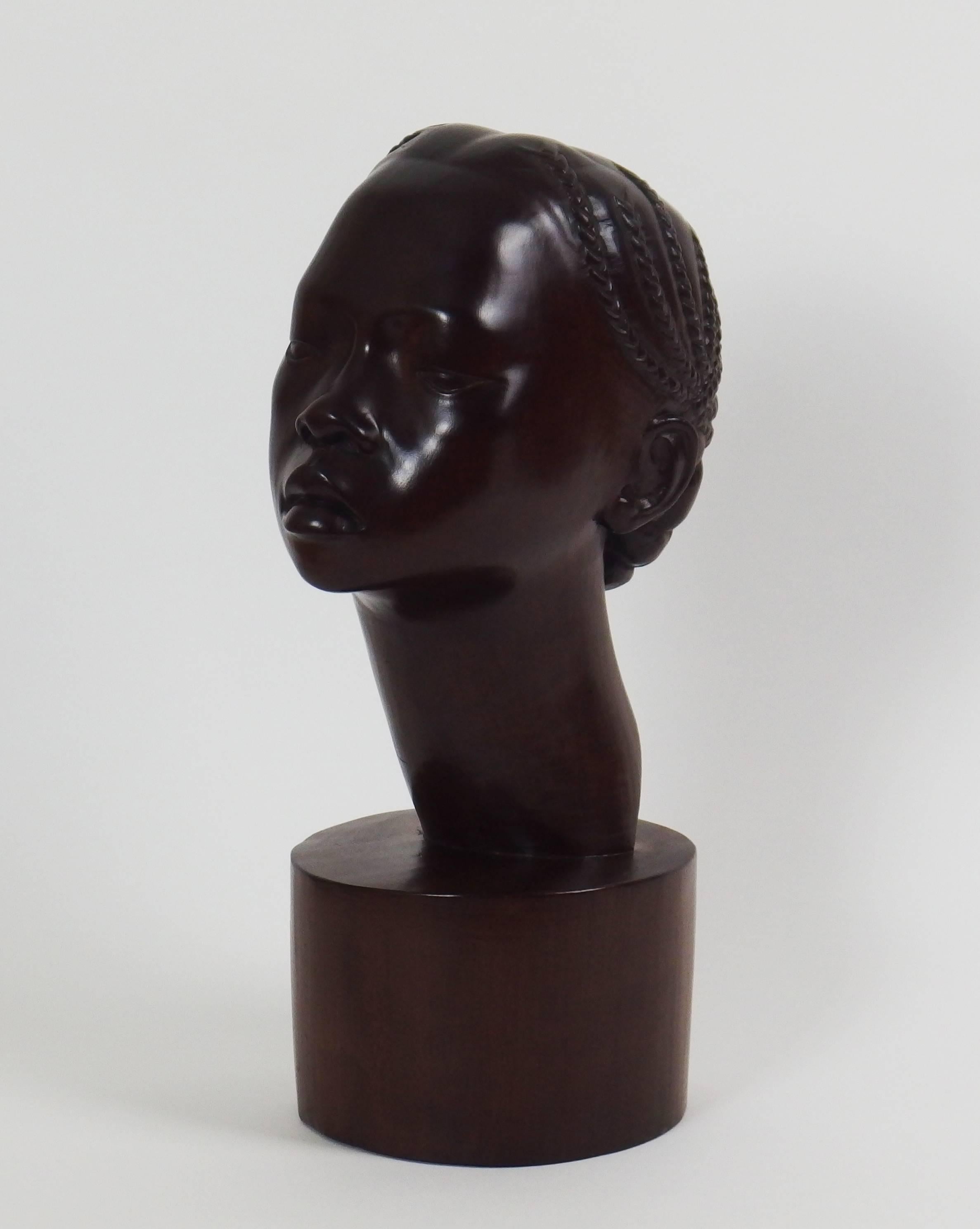 Art Deco Carved Wood Sculpture of a Woman Head by Rakotondrabé For Sale