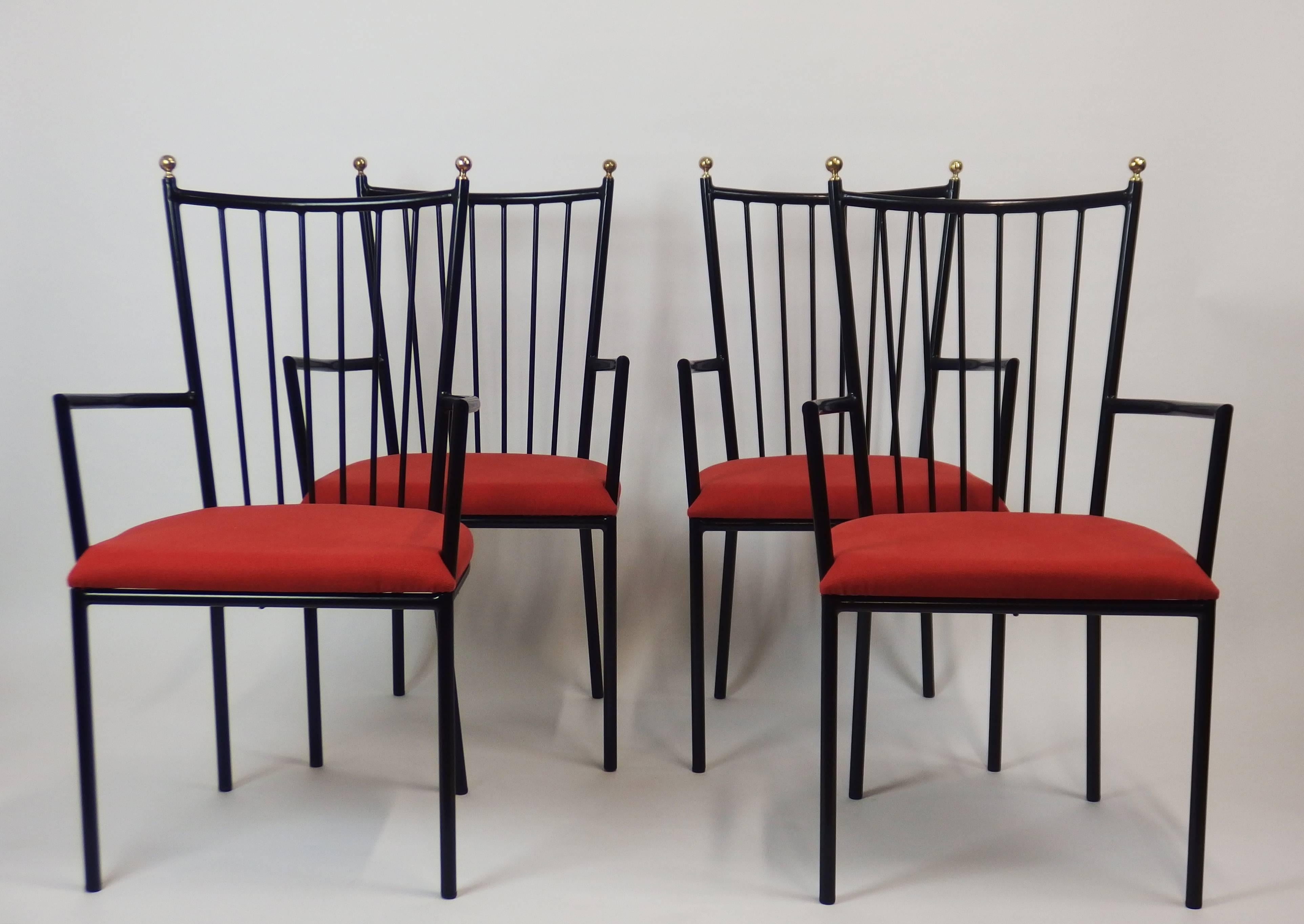 Set of four armchairs with a black enameled tubular iron structure and brass knobs on the top of the backs. Designed by Colette Gueden in the 1950s.
Measure: Seats height 18.5in.