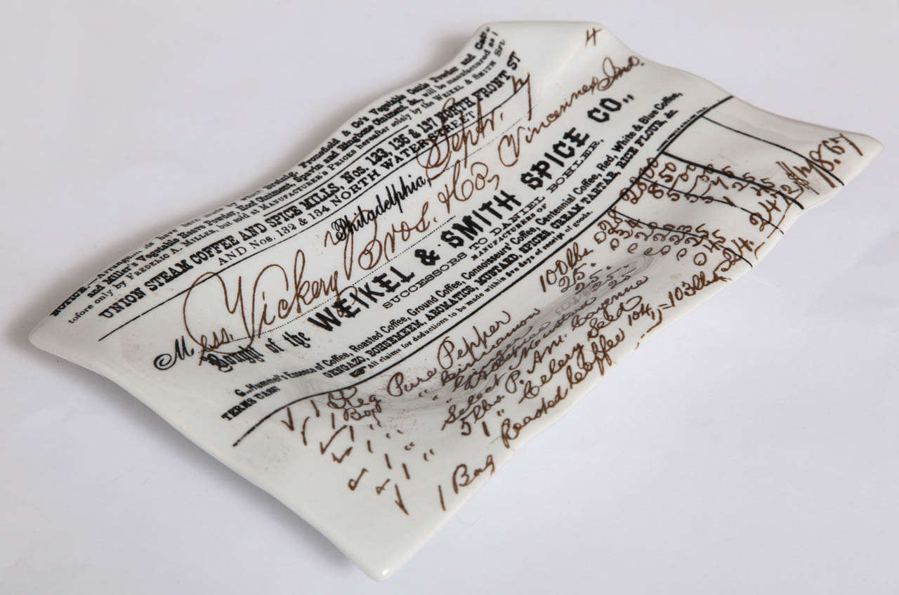 Large ceramic dish made to look like an antique bill of sale from Weikel & Smith Spice Co. of Philadelphia. Designed by Piero Fornasetti and signed to reverse.