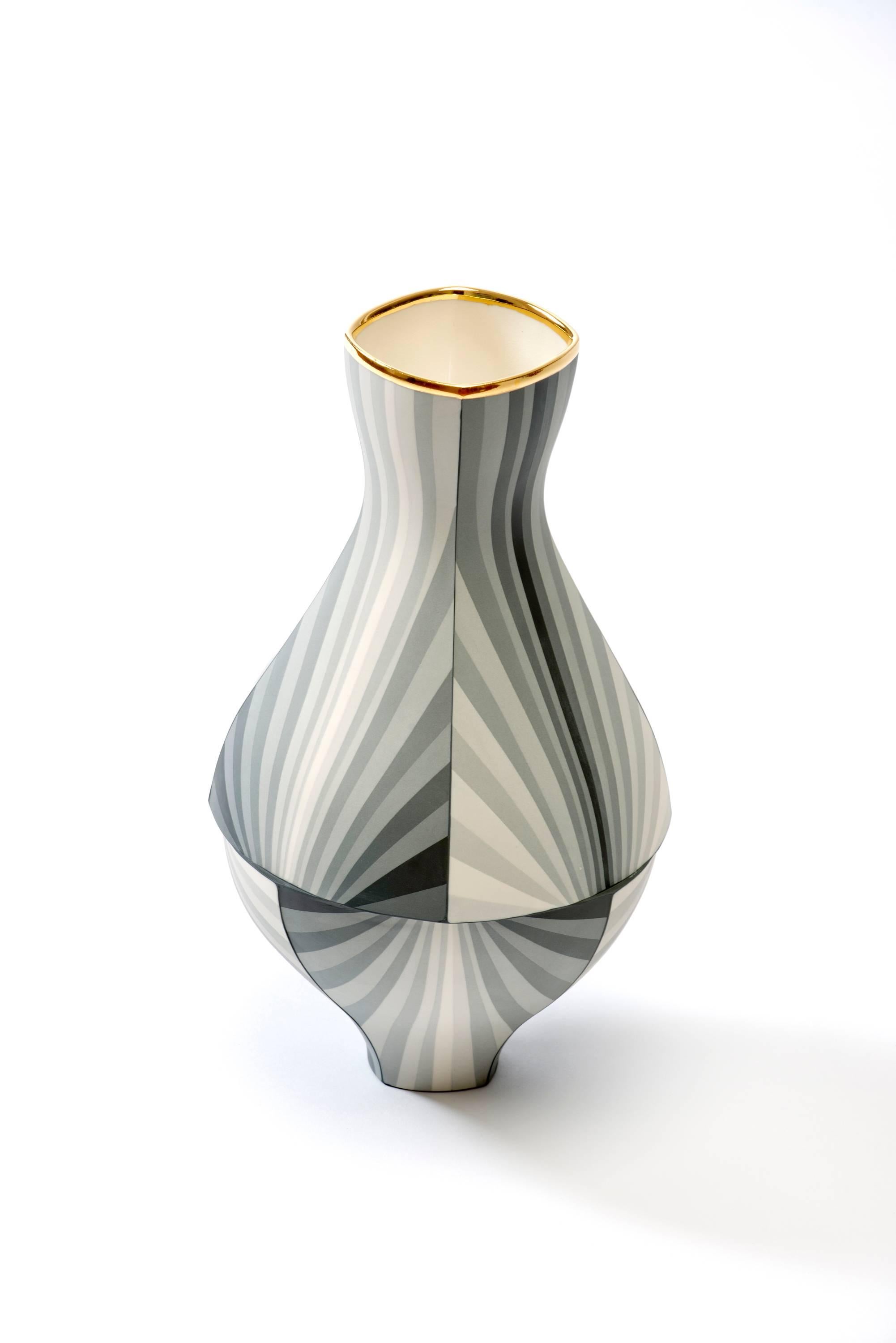 Optically mesmerizing and expertly crafted unique porcelain and gold luster vessel by artist Peter Pincus.

Born in Rochester, NY, Peter Pincus is a ceramic artist and instructor.  He joined the School for American Crafts as Visiting Assistant