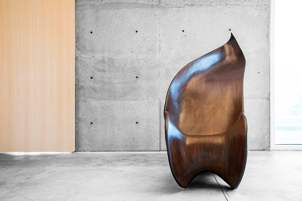 Gulla Jónsdóttir 
Petal Chair, 2013
Ash Wood and stain
36 x 54 x 72 in

Icelandic-born Gulla Jónsdóttir creates unexpected and poetic modern bespoke furniture pieces inspired by her Nordic roots. Her designs are praised for their sensual and dynamic