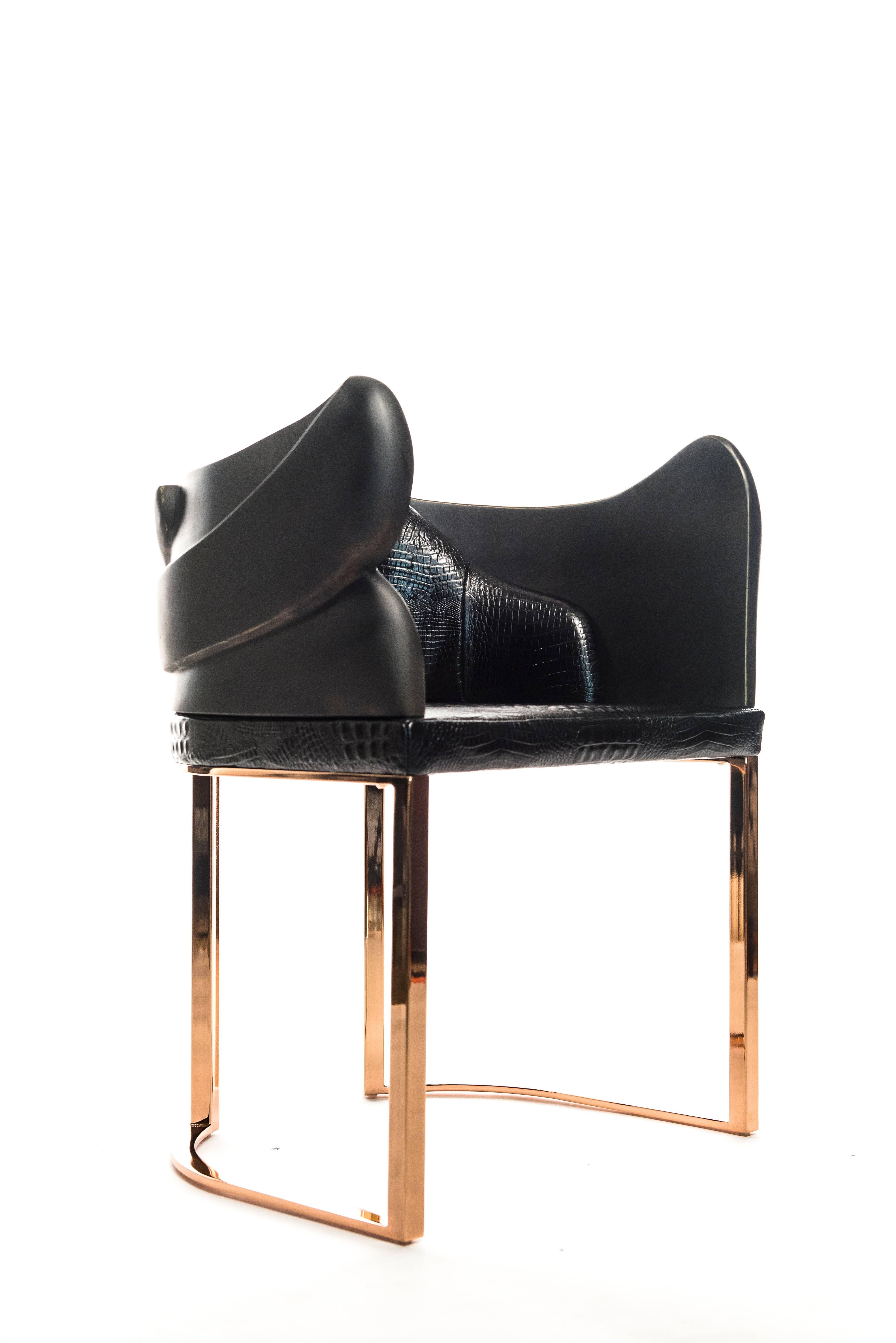 Gulla Jónsdóttir
Cuff Chair
Rose gold, bronze, embossed crocodile leather
24 x 22 x 38.5 in
Seat height 18.5 in
Edition of 12

Icelandic-born Gulla Jónsdóttir creates unexpected and poetic modern bespoke furniture pieces inspired by her Nordic
