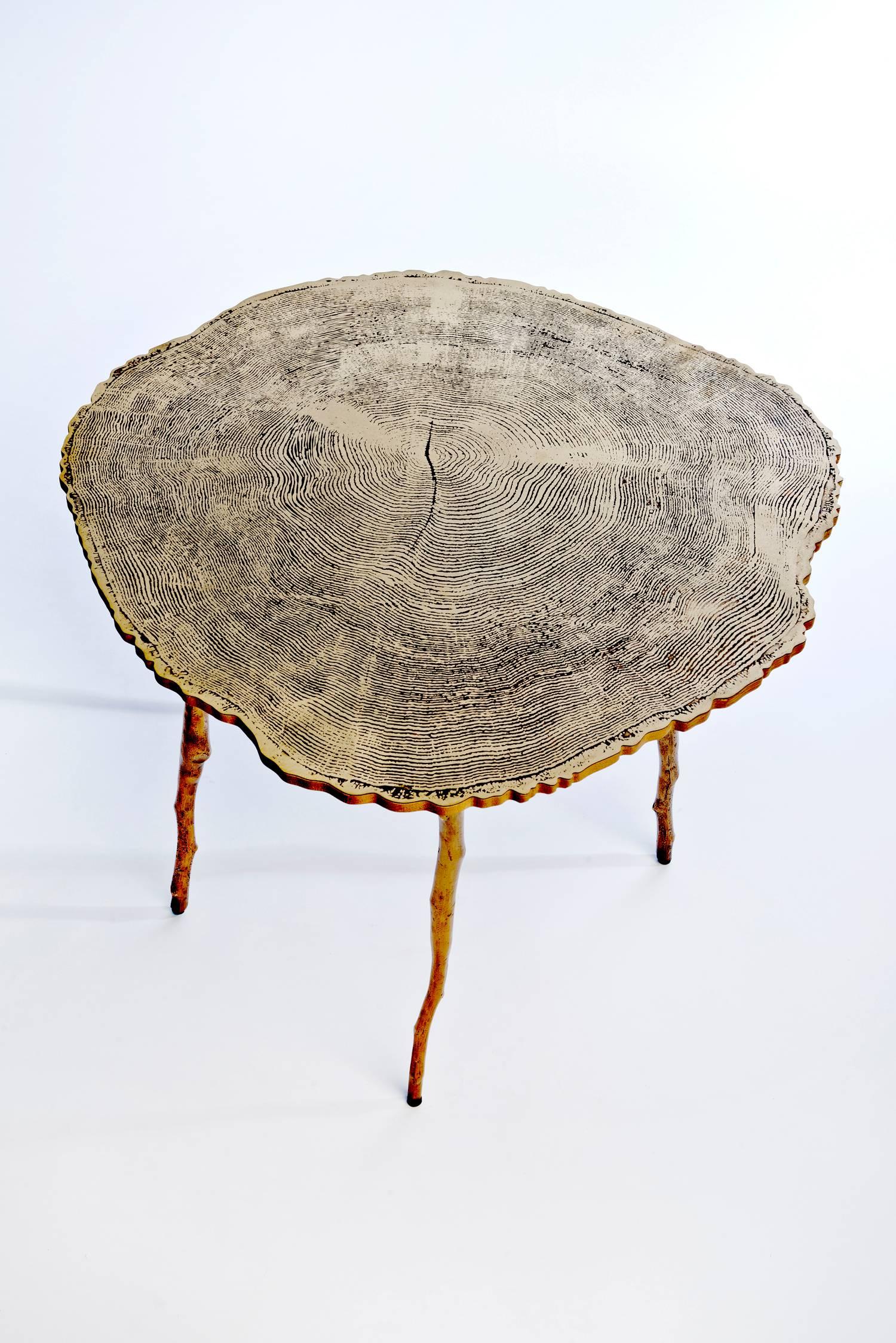 Sharon Sides
Echo Side Table, 2015
Hand formed acid etched brass, bronze and stacked laminated oak 
18.25 x 22.75 x 22 in
Edition of 12

Sharon Sides is the Owner & Chief of Design of Sharon Sides Design Studio.

Sharon is a B.DES graduate from the