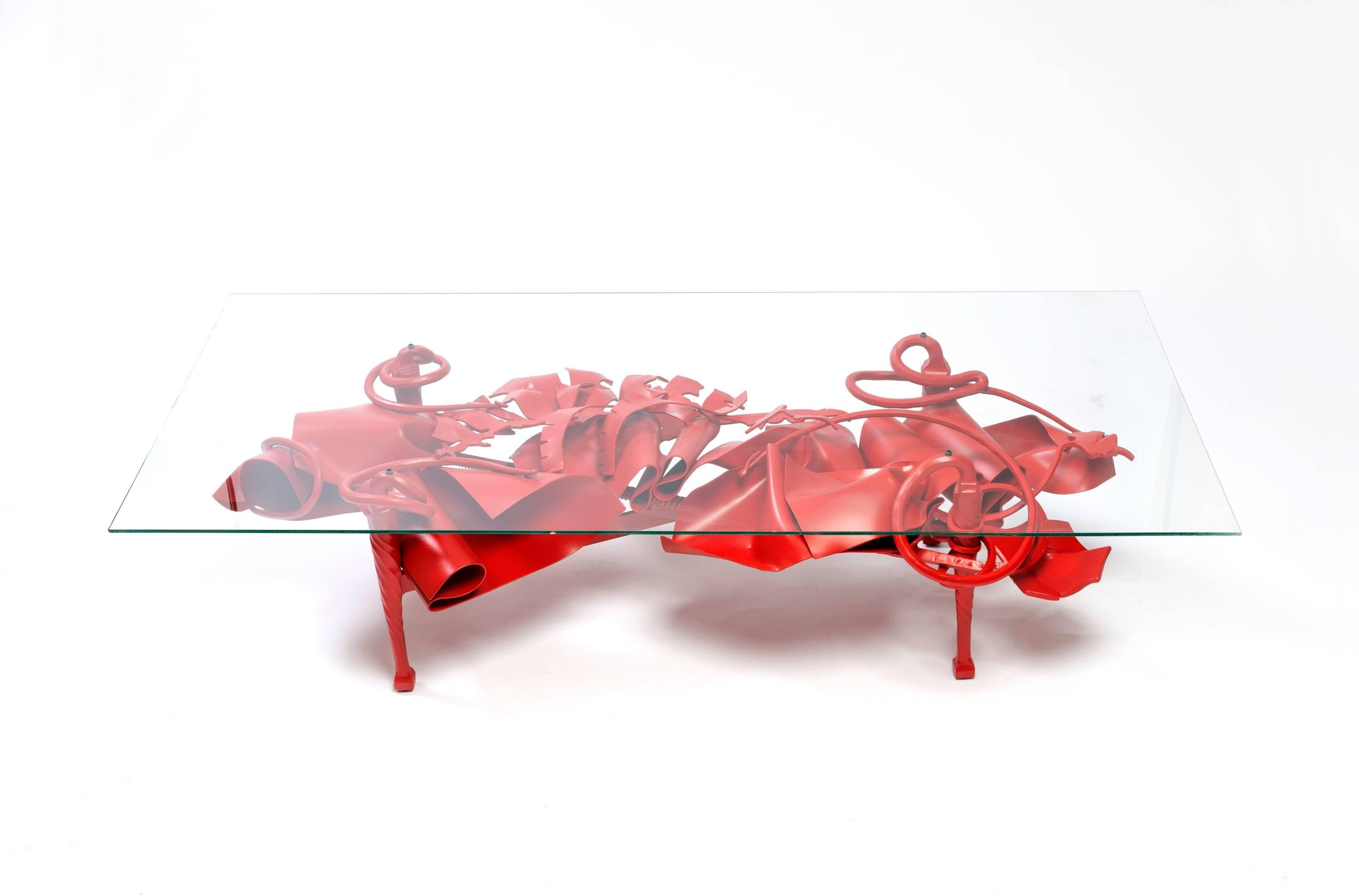 The unique coffee table design by world renowned sculptor and metalworker Albert Paley is the first piece from his new body of work, Convergence: Color and Form. High-lead glass top is available separately.

Albert Paley (born 1944) is an American
