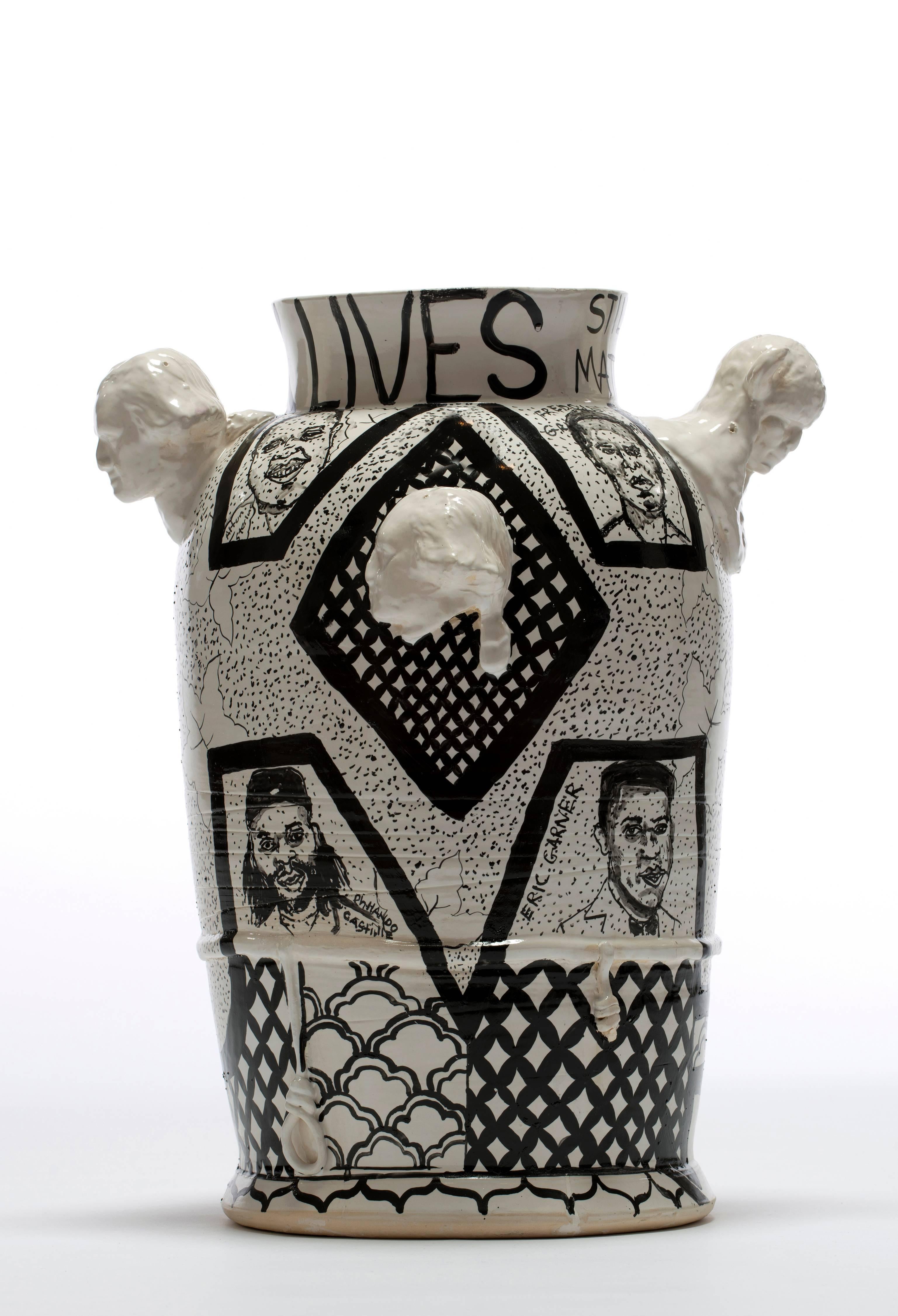 A Century of Black Lives Mattering is made by Roberto Lugo out of porcelain, china paint and gold luster.

Best known for expertly thrown ceramic vessels that are illustrated with activists, political figures, and hip-hop legends, Lugo aims to reach