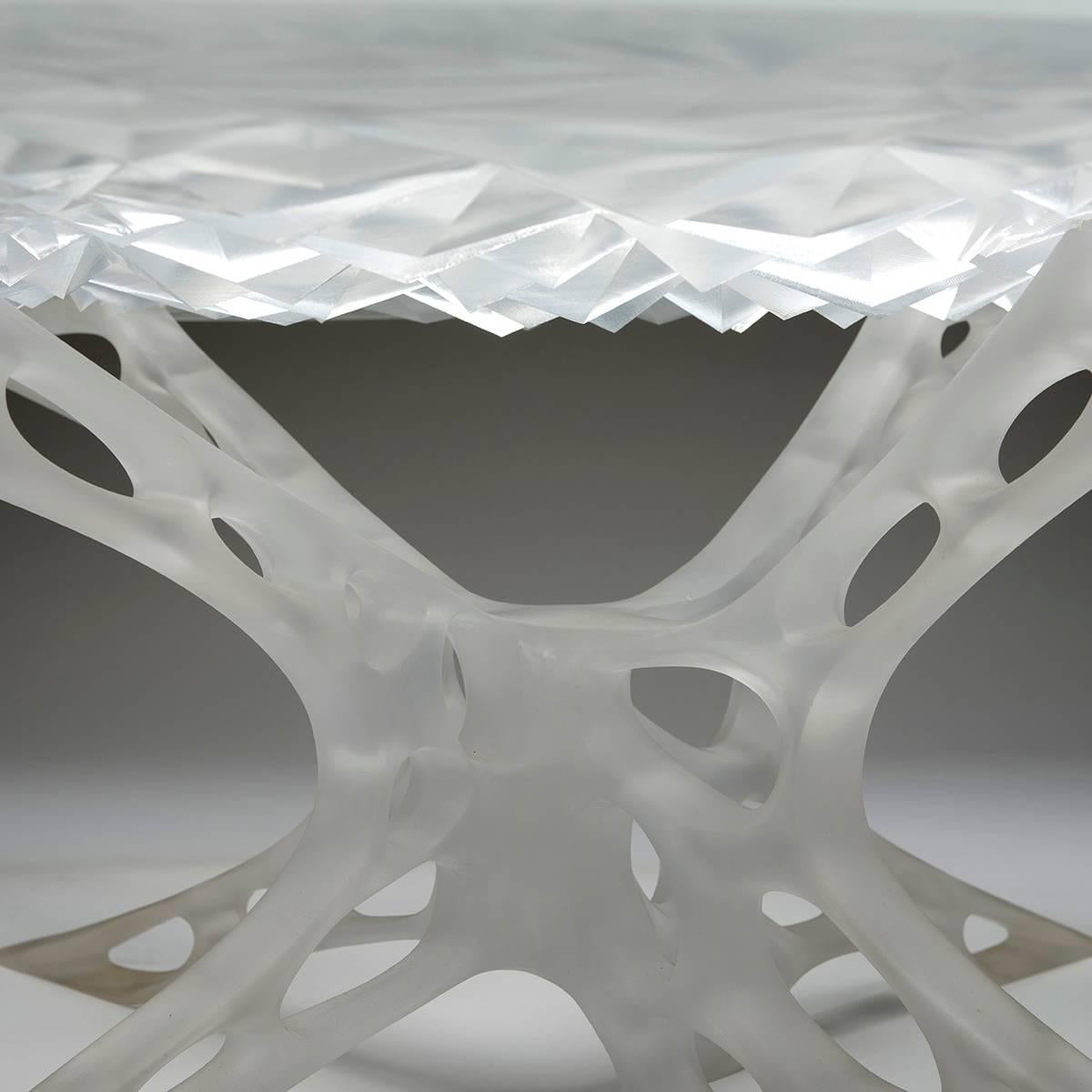 Chimeric Table is fabricated out of acrylic by John Shields.

John Shields is an architect and designer based in Philadelphia, Pennsylvania.
Point B utilizes the latest digital tools to enable simultaneous design and fabrication. By practicing