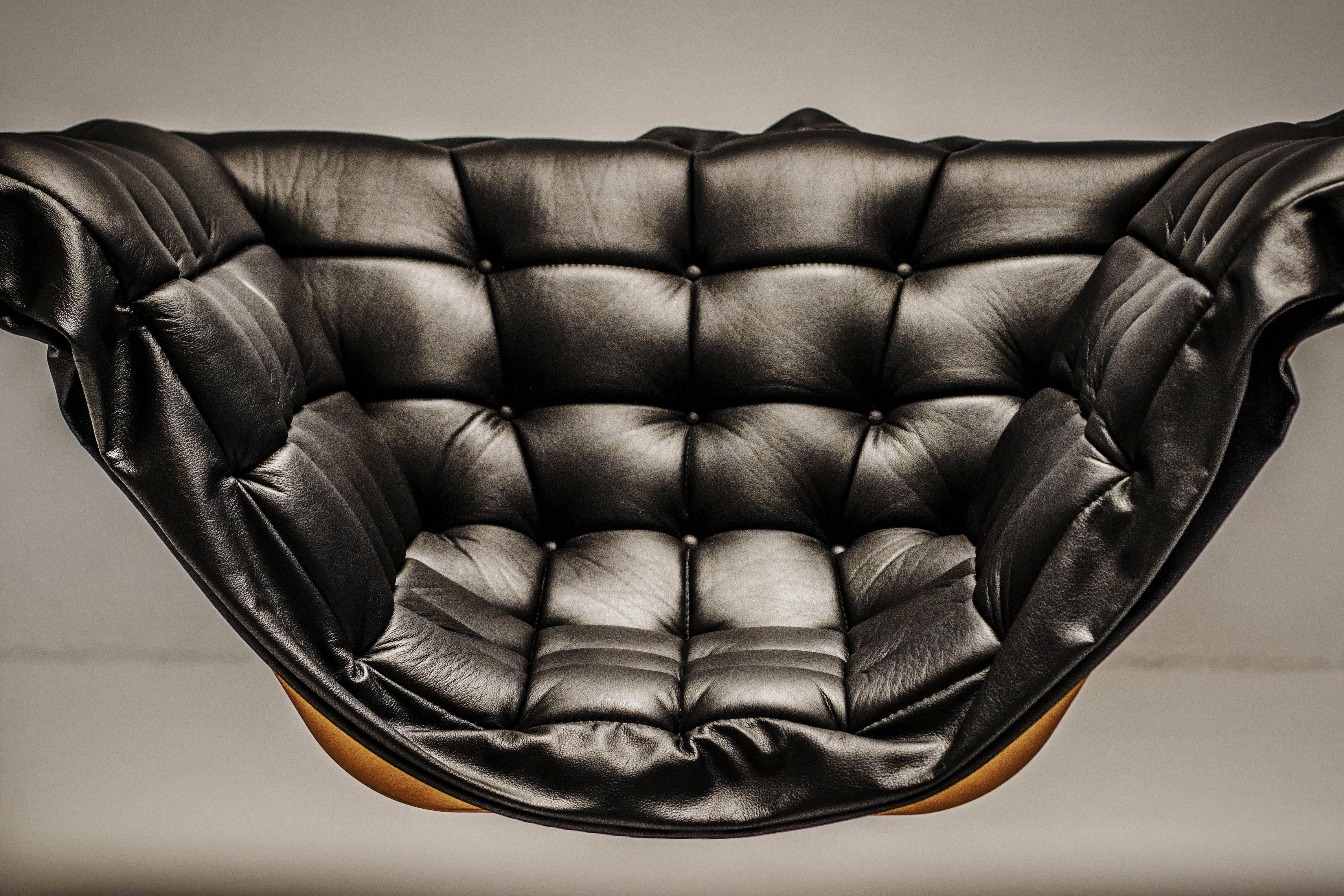 Orbital armchair was designed by Parisian design studio Harow. The sleek bronze skeletal structure and leather upholstery is a classic coupling of luxury materials with an edgy and industrial design. It is a limited edition piece that can also be
