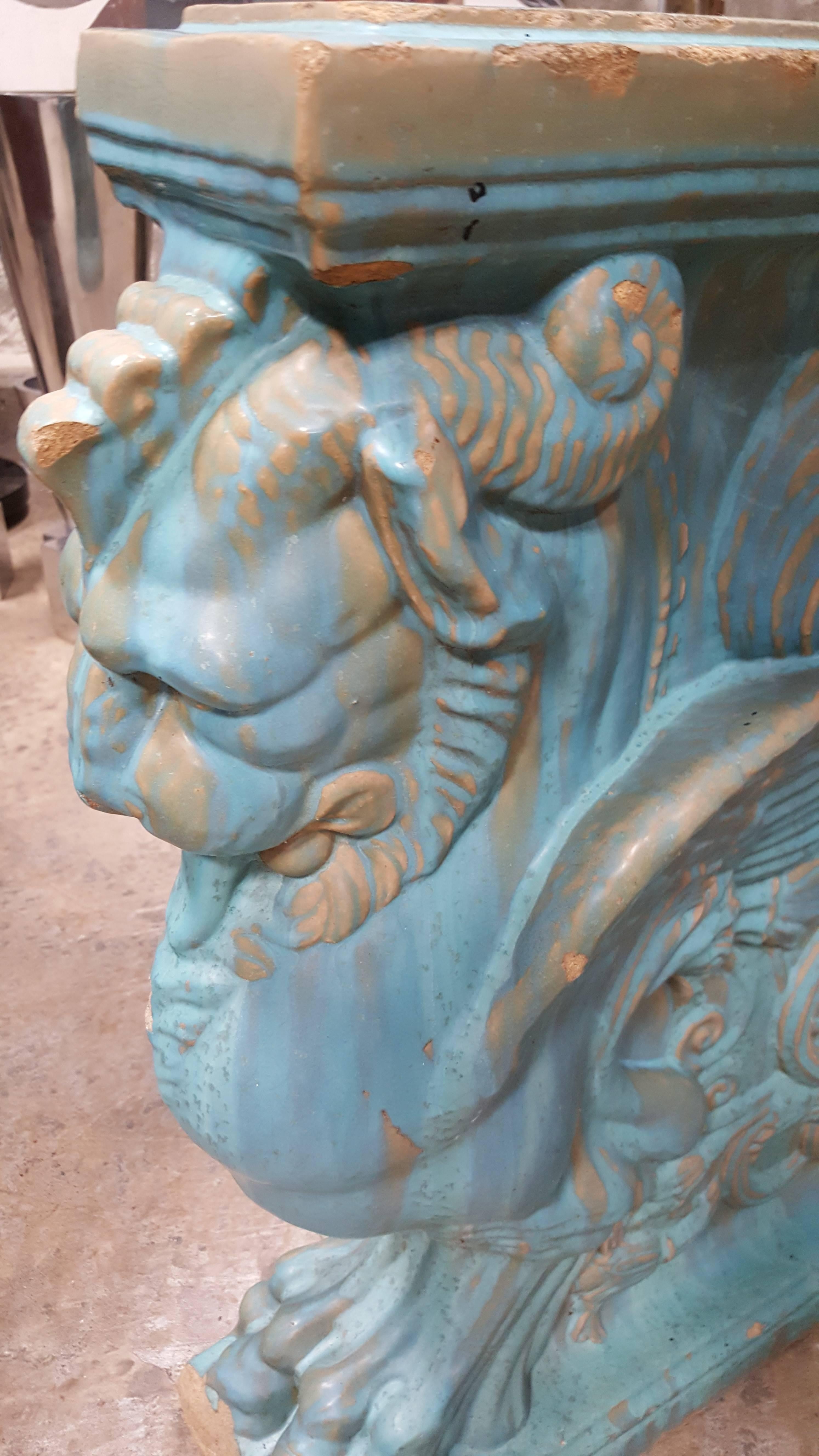 Exceptional and rare early 20th century Gladding, McBean winged lion pottery pedestal. Beautiful drippy aqua blue glaze. A striking architectural garden structure or ornament which can be enjoyed as an interior or exterior design element. Once part