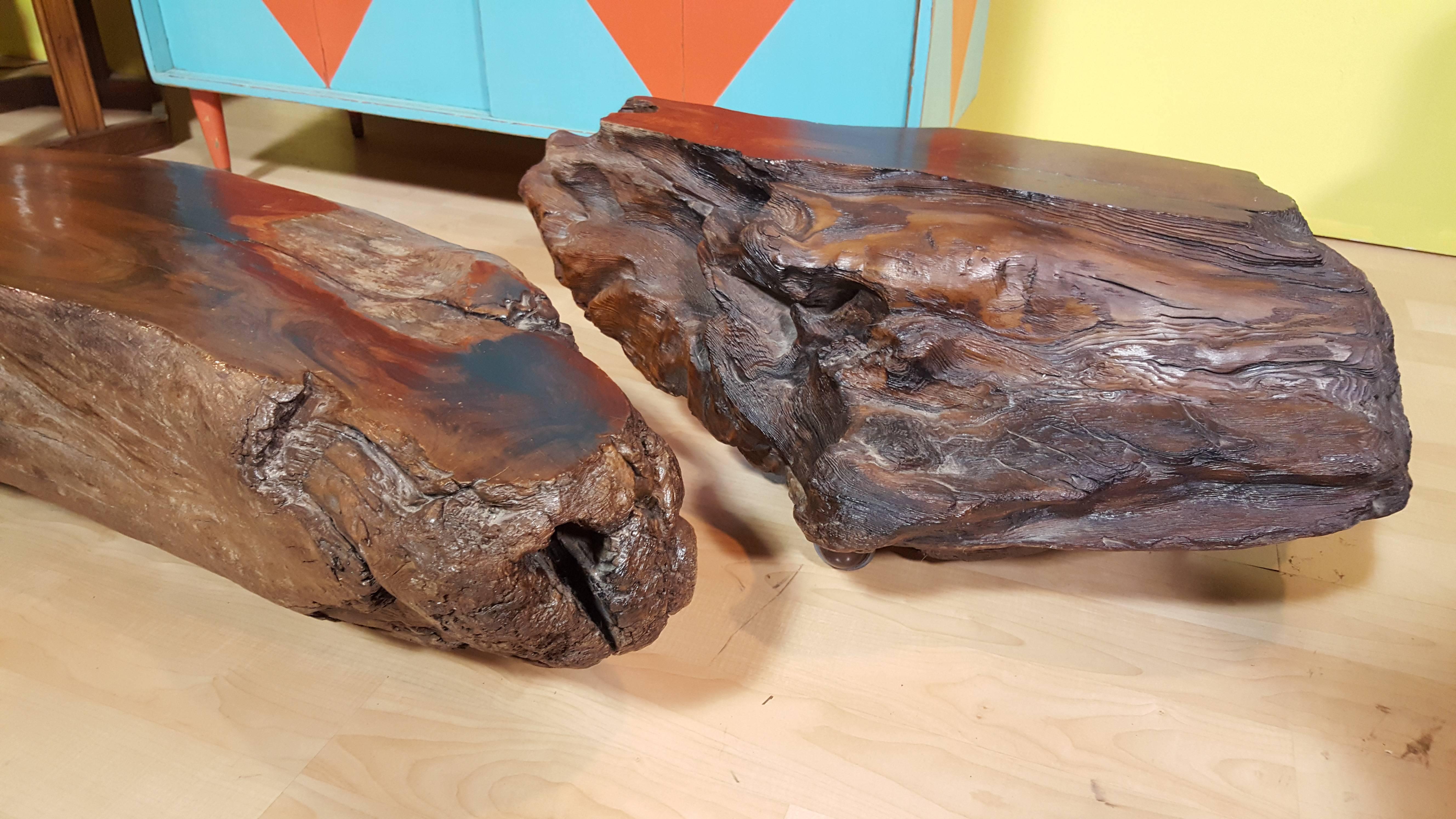 Driftwood coffee table and accompanying end table. Made in the 1970s of redwood driftwood. Beautiful figured wood grain tops. Tables would accommodate glass tops if desired. End tables measures 33.5