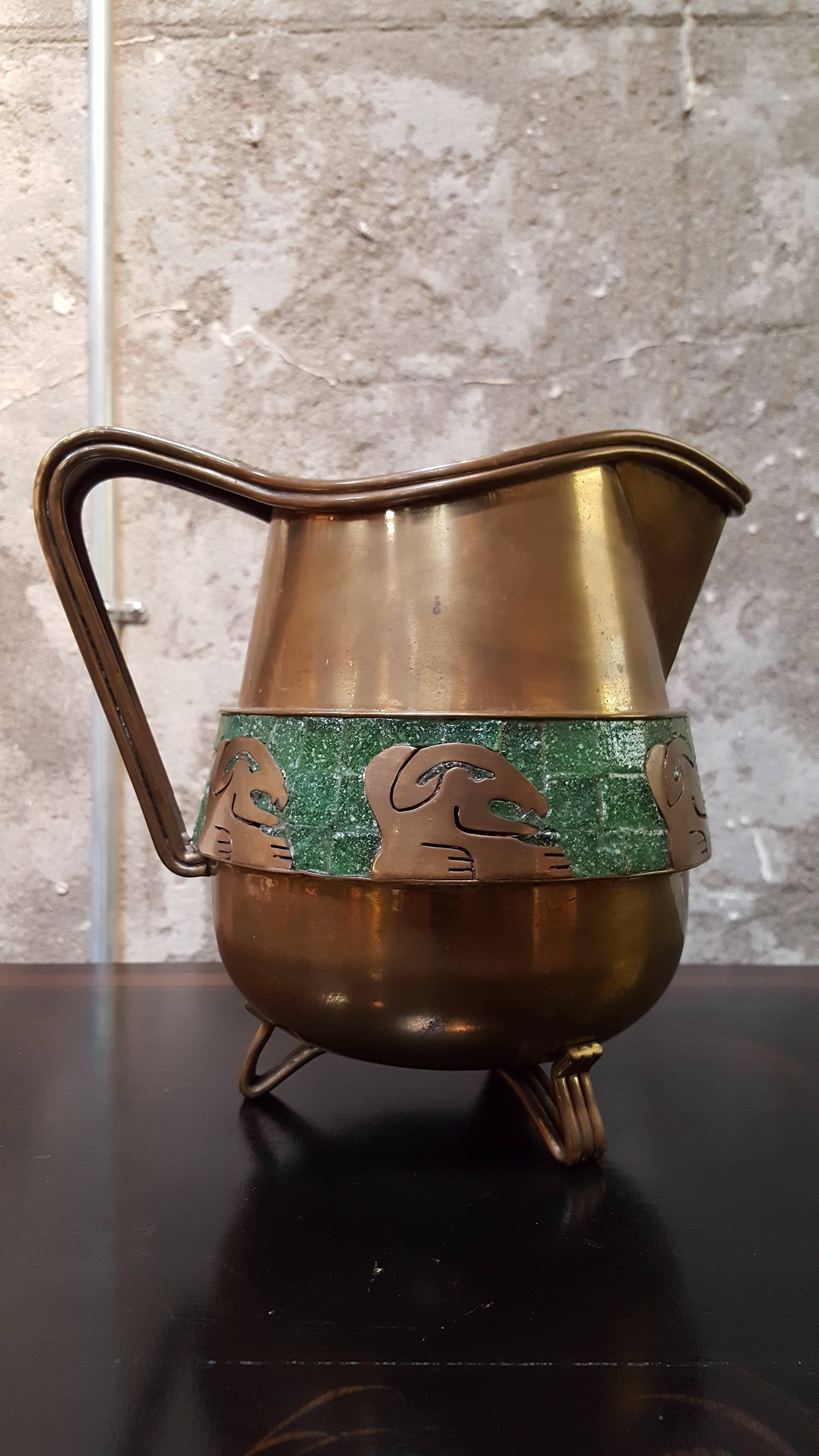 A mid-20th century water pitcher handcrafted in glass mosaic tiles and brass by Salvador Teran, Mexico, 1960s. Signed on base.