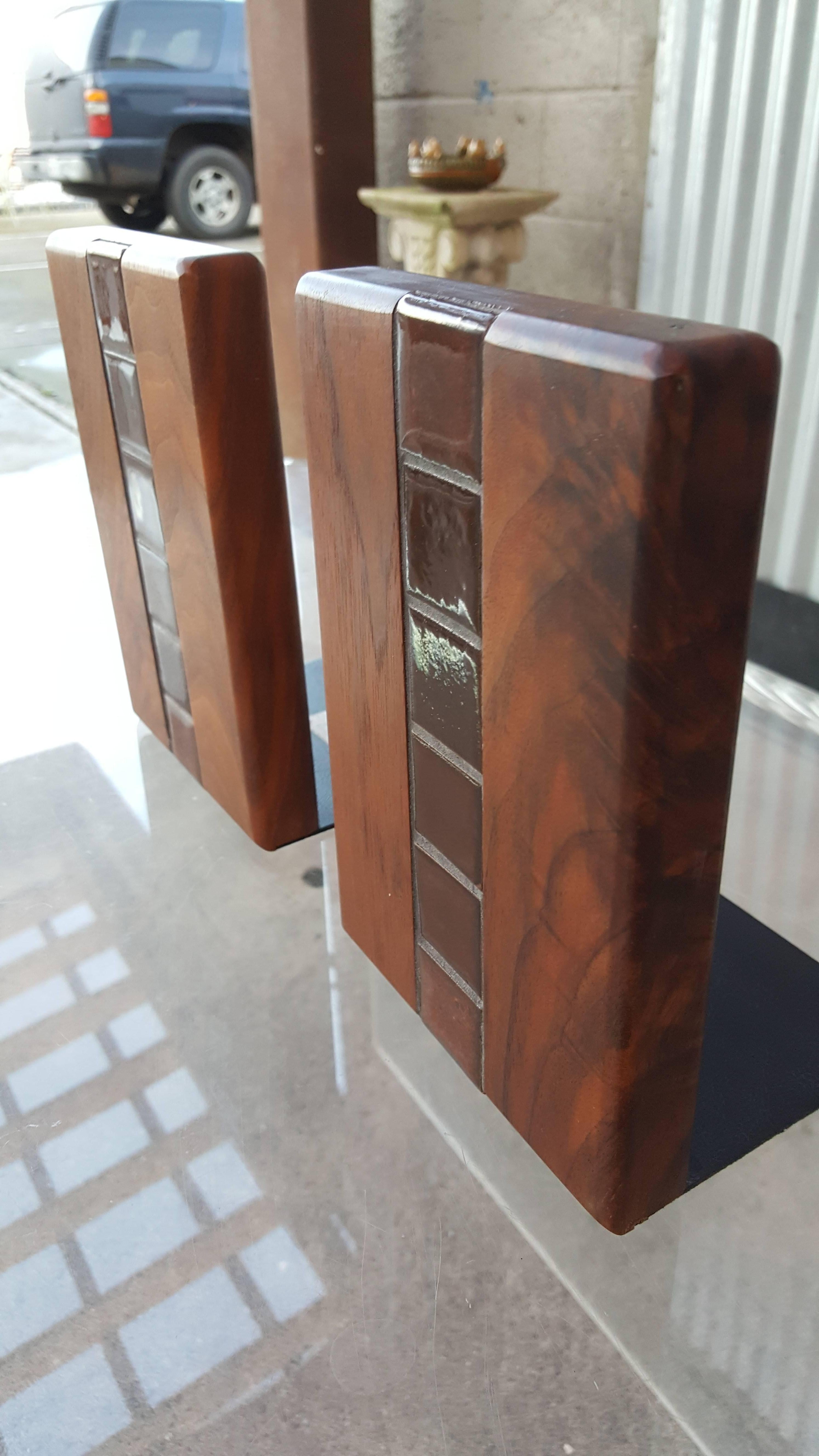 A pair of Mid-Century Modern solid walnut bookends with chocolate brown tile detail. Designed by Jane & Gordon Martz for Marshall Studios.