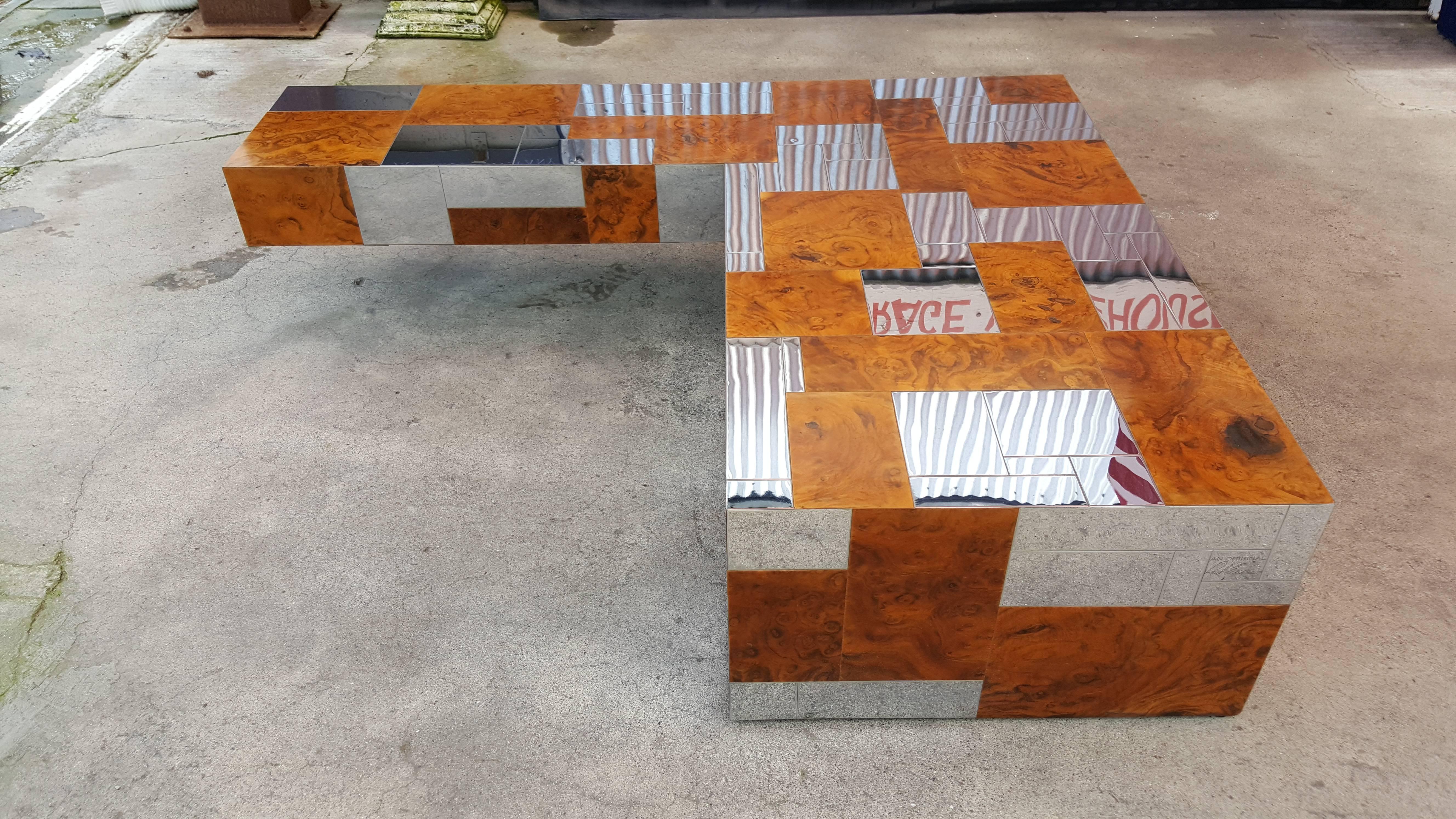 Exceptional cantilevered coffee table by Paul Evans Studio for Directional. PE 400 series, circa. 1975. Patchwork design with burl wood and chrome panels. Very good vintage condition with age appropriate wear.