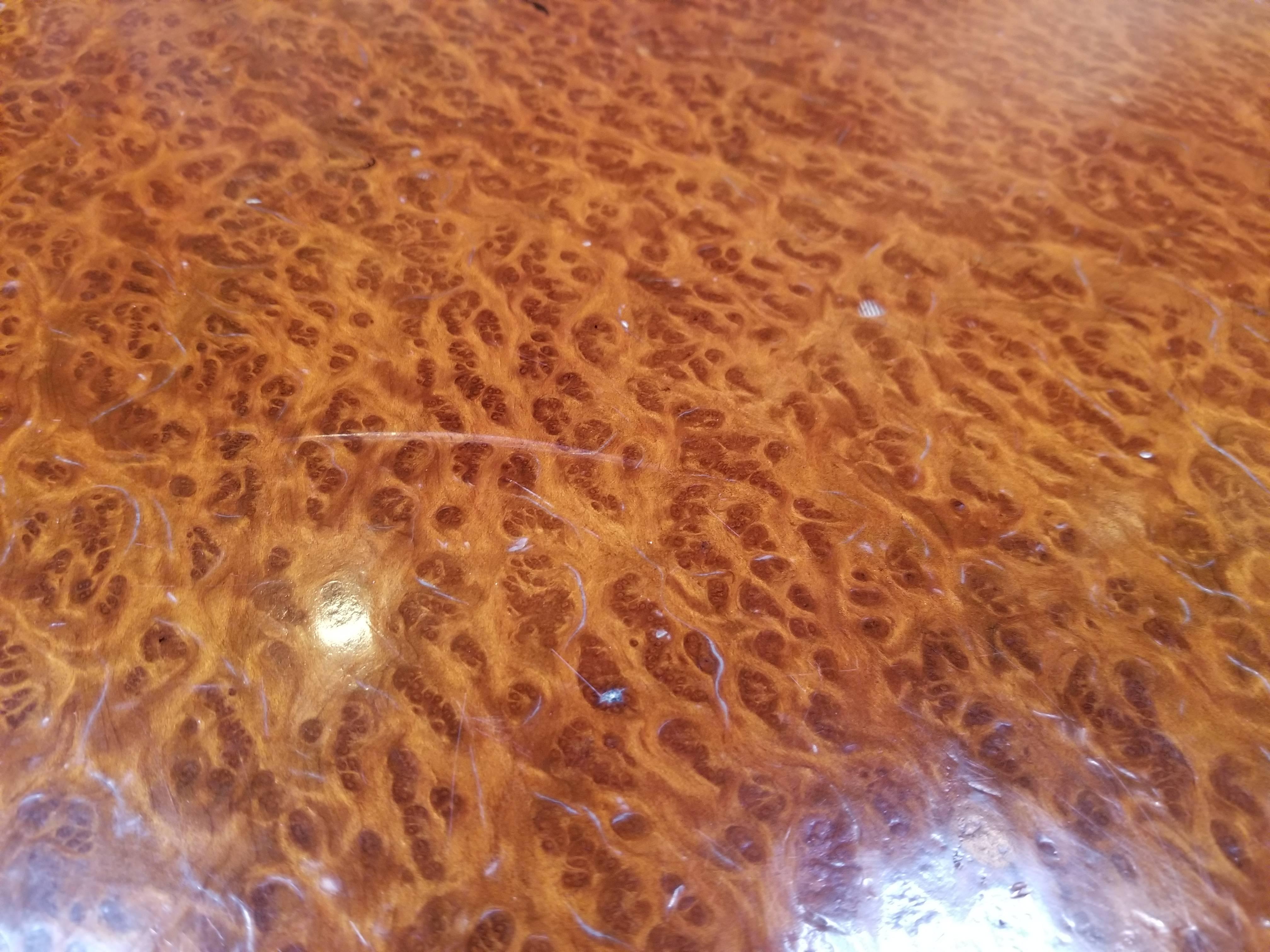 A substantial California craft redwood burl live edge coffee table with root base. Notice highly figured grain pattern to top surface.