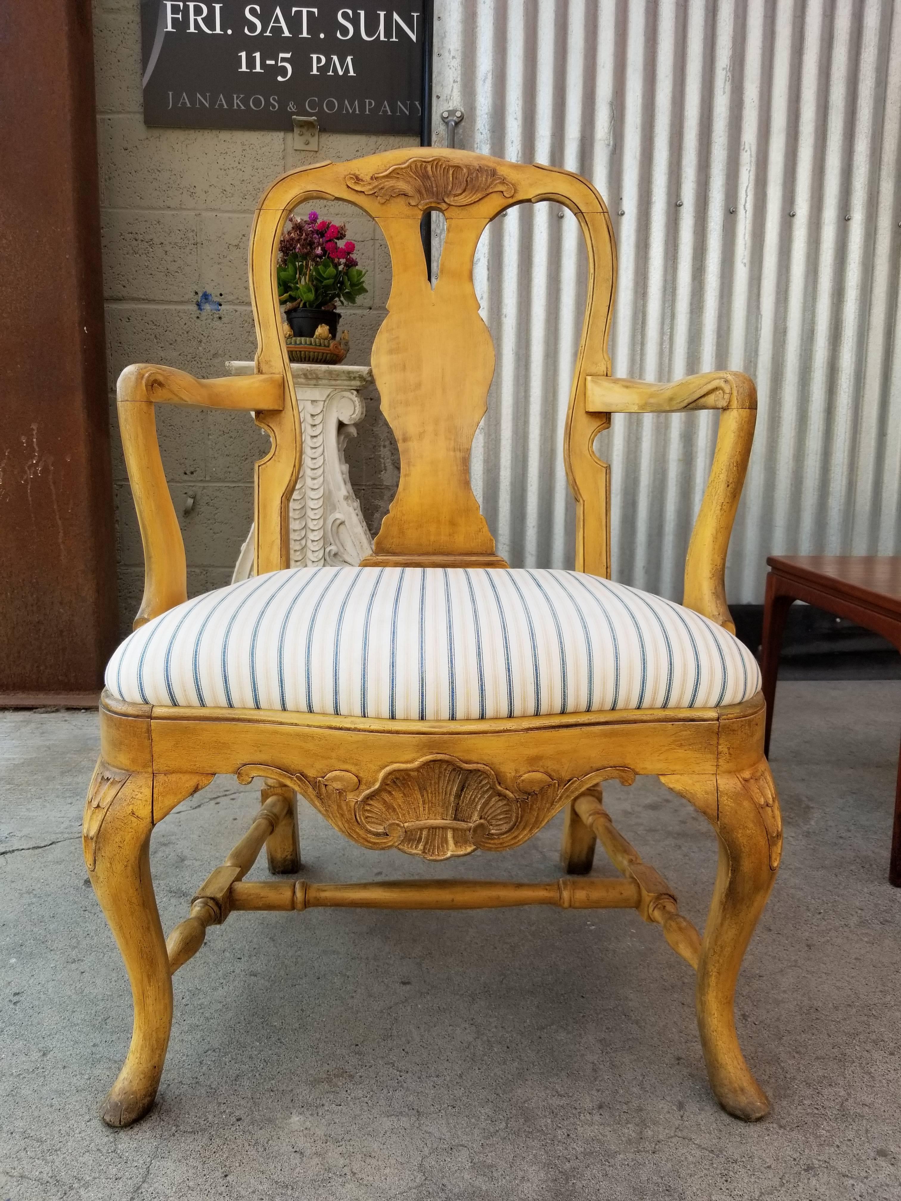 Early 20th century hand-carved Rococo style chair with painted surface. Quality and sturdy construction.
