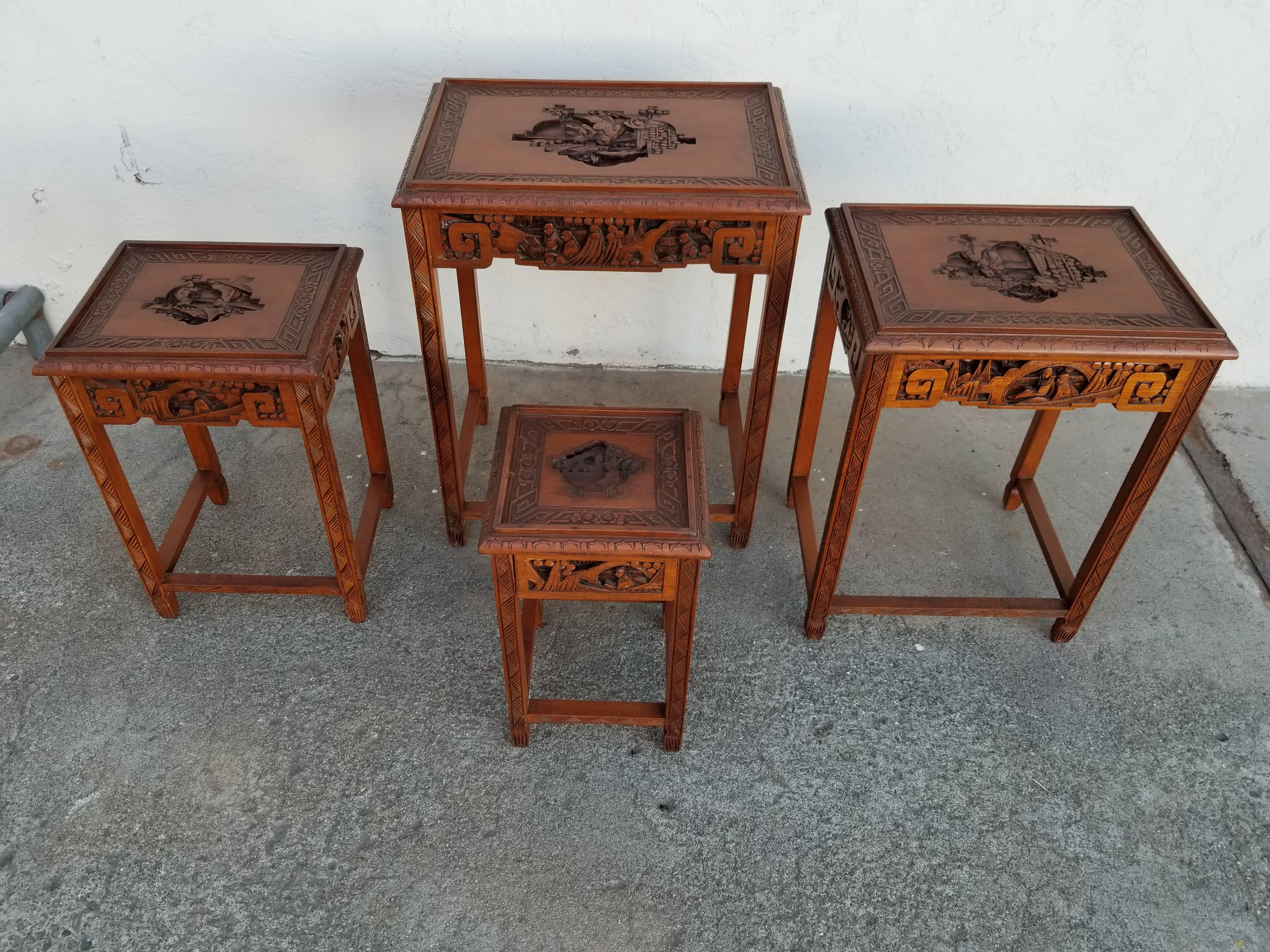 carved nesting tables