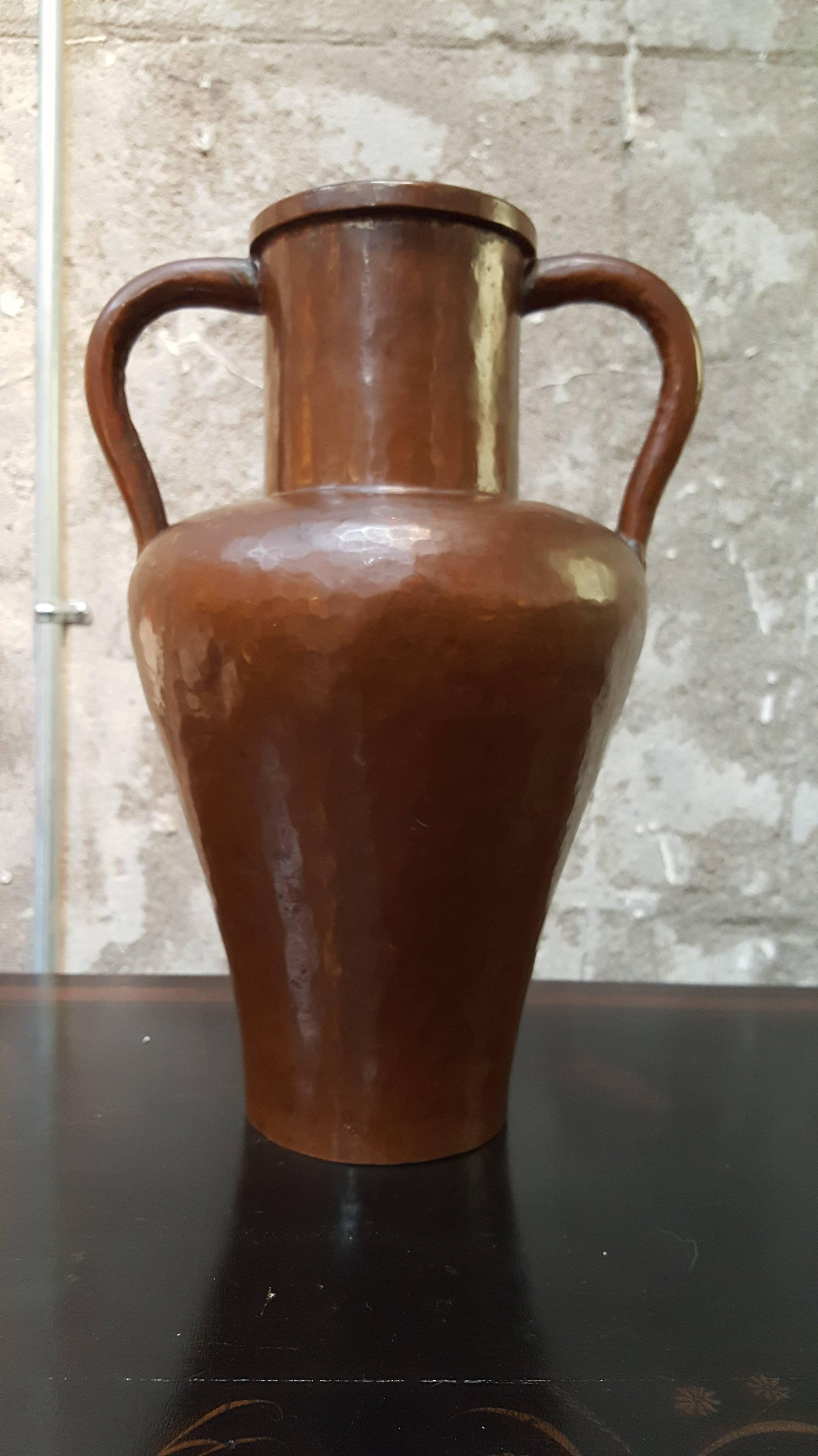 Early 1900s Arts & Crafts hand-hammered copper amphora vase. Precise and highly skilful hammered technique and craftsmanship, original finish with deep, rich, original patina. Signed on base. Unknown artist.