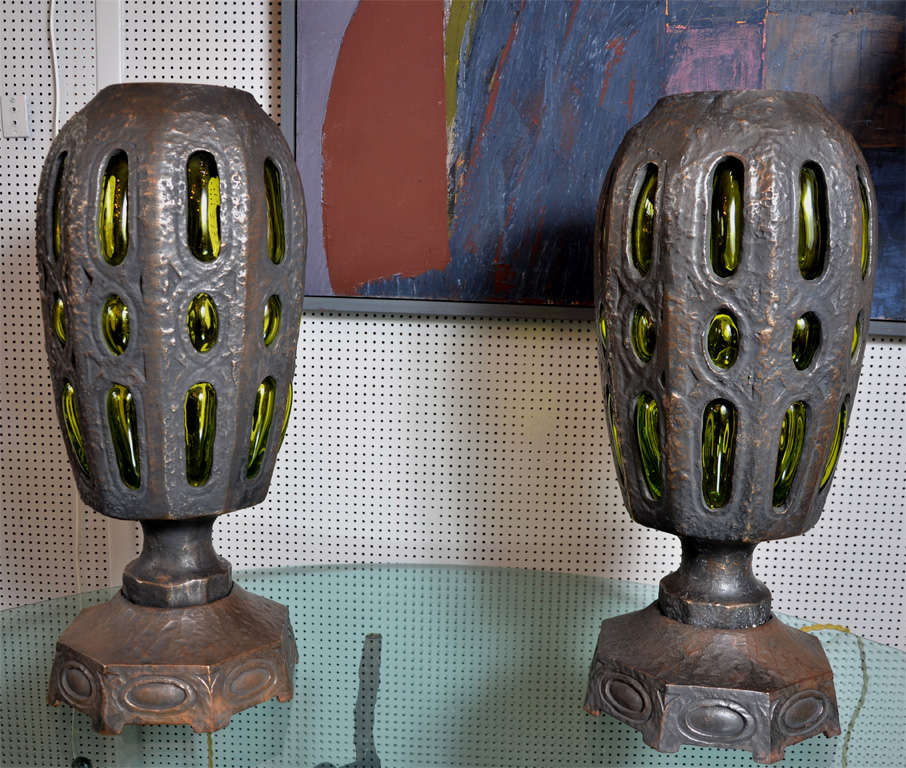 Very unique pair of bronze and glass lamps.
