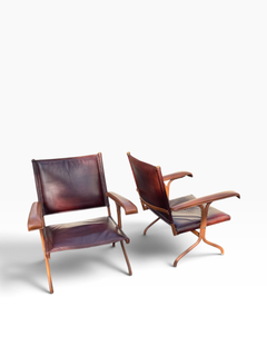 1950's Stitched leather armchairs by Jacques Adnet