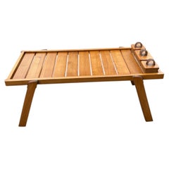 1950's Stitched leather and oak coffee table by Jacques ADNET