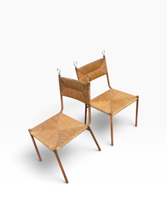 1950's Stitched leather and rattan chairs by Jacques ADNET