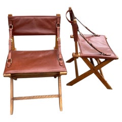 1950's Stitched leather armchairs by Jacques ADNET