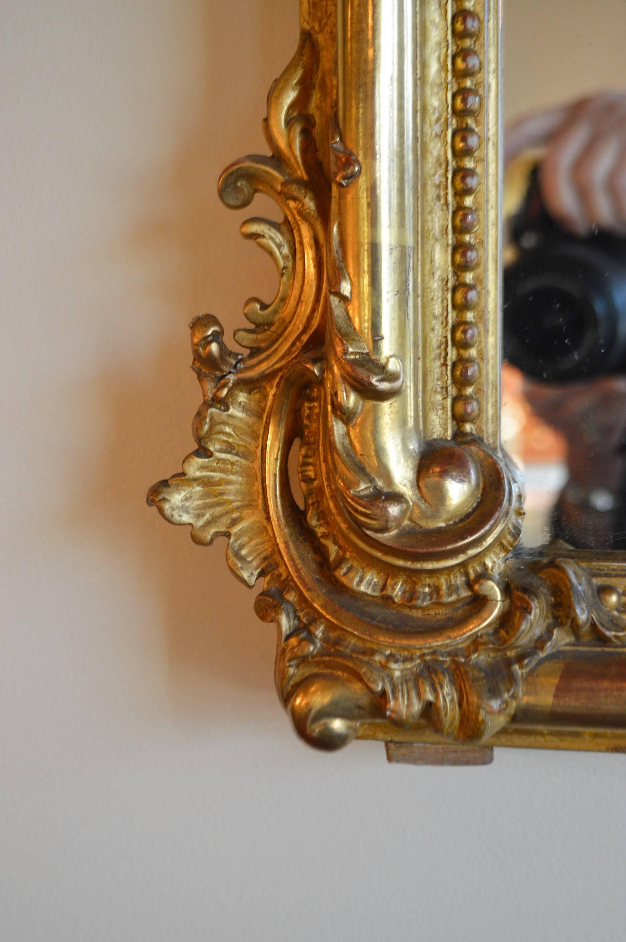 Wood Louis XV style gilded mirror