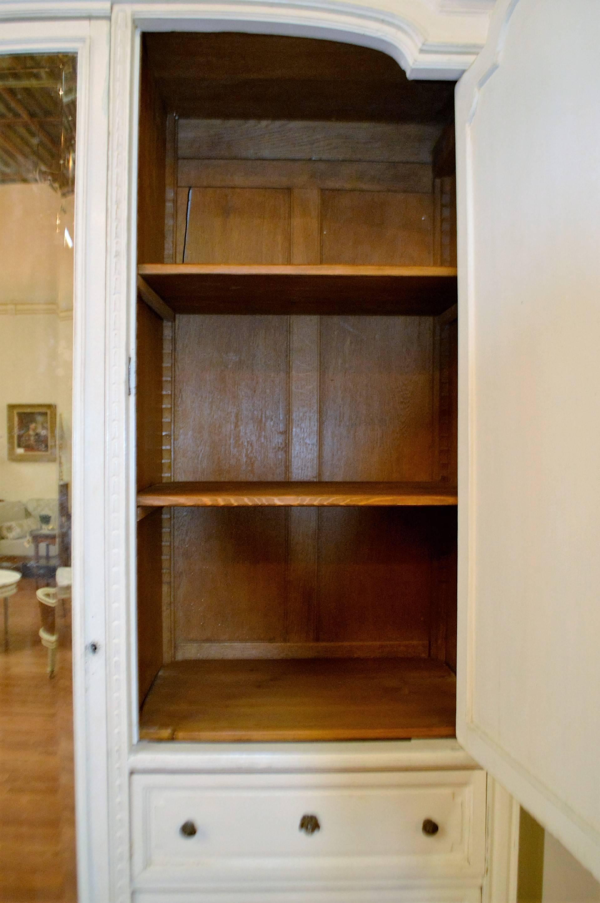 19th century painted Louis XVI style armoire with the original mirror, other side 
has the four drawers for storage, a very practical piece of furniture.