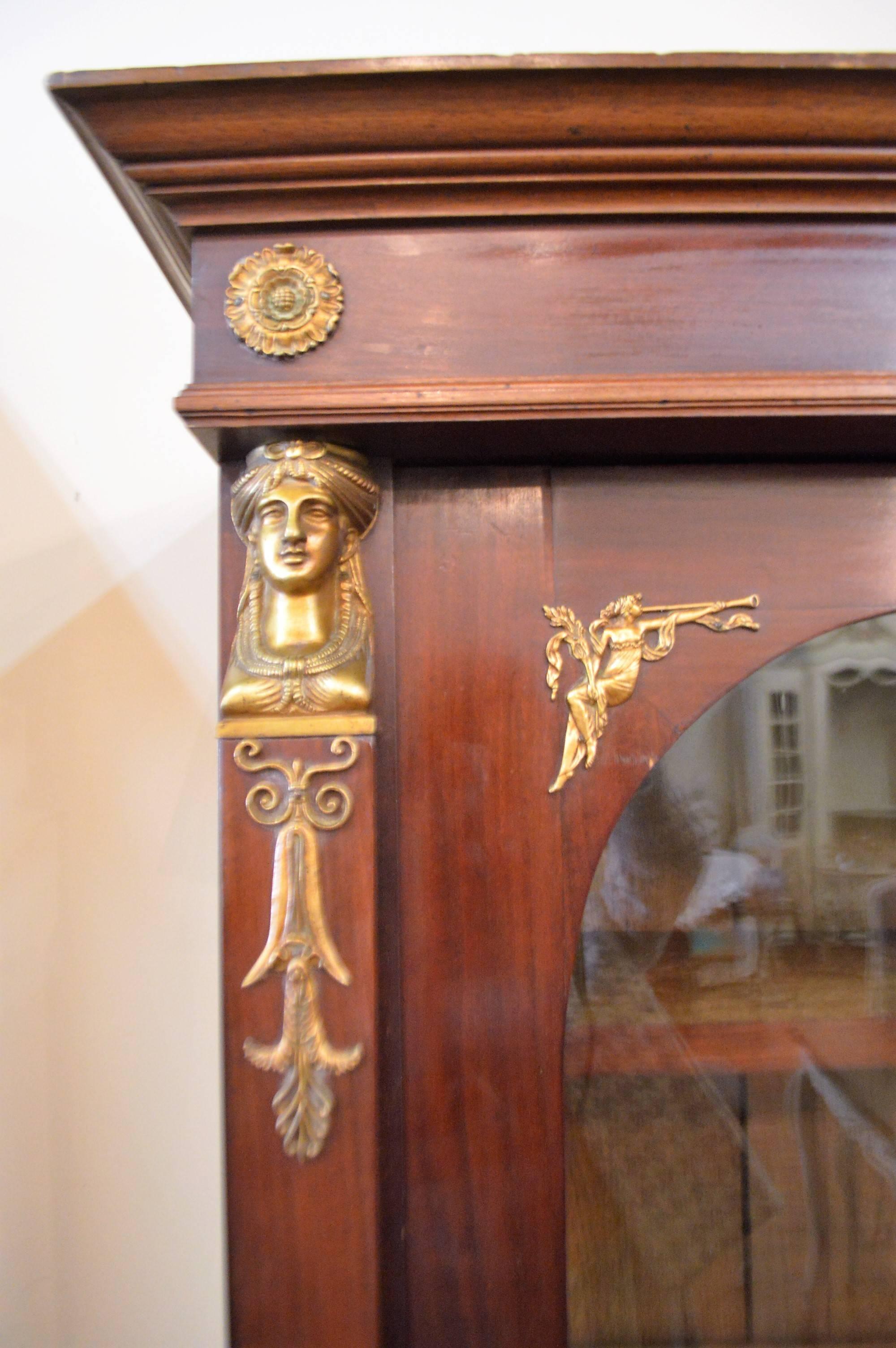 French Empire Style Mahogany Bookcase with Bronze Sphinx Headdress and Feet