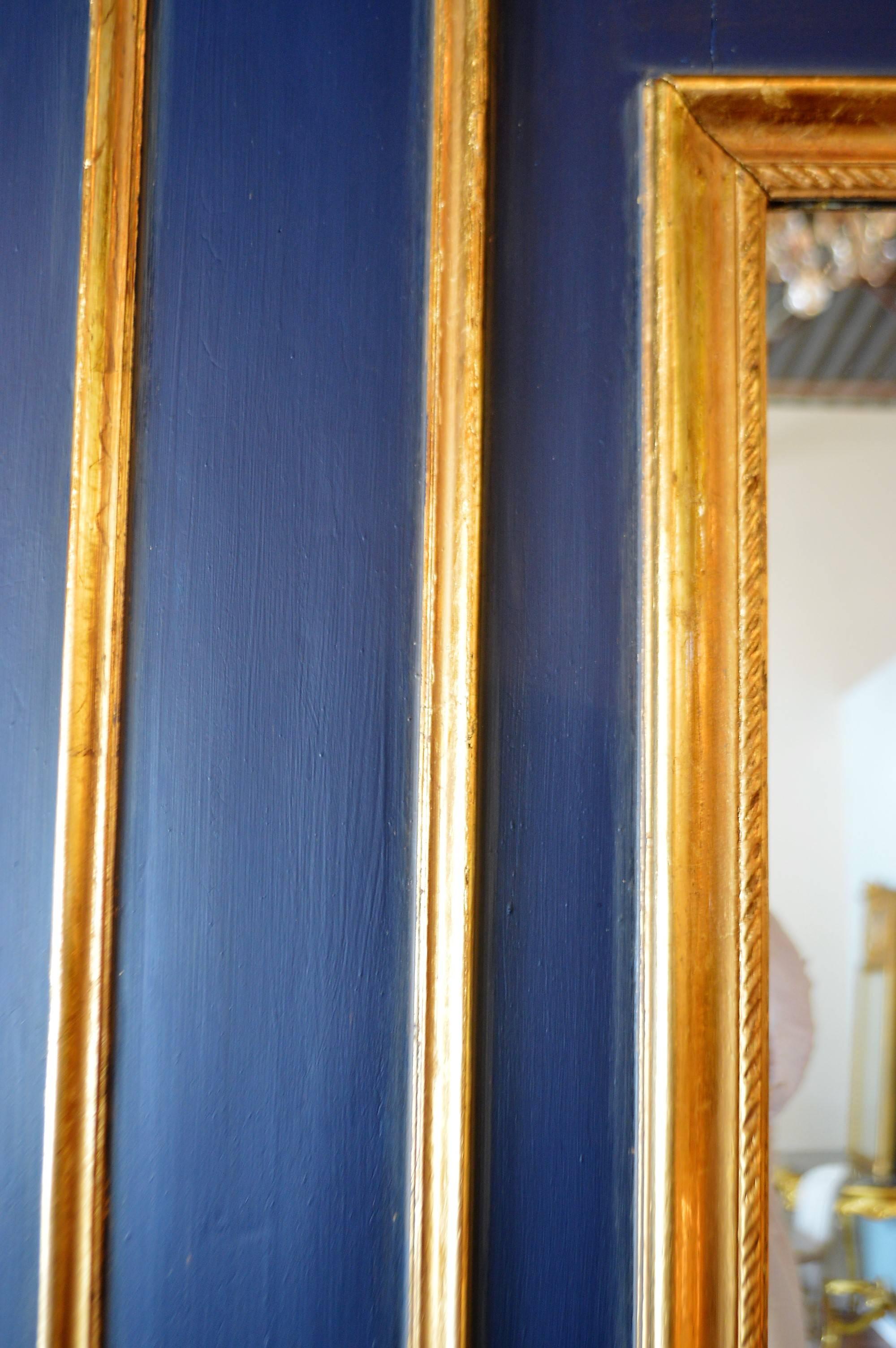 Louis XVI Style Trumeau Mirror Painted Dark Blue with Gilt Details Accents In Excellent Condition In Oakville, ON