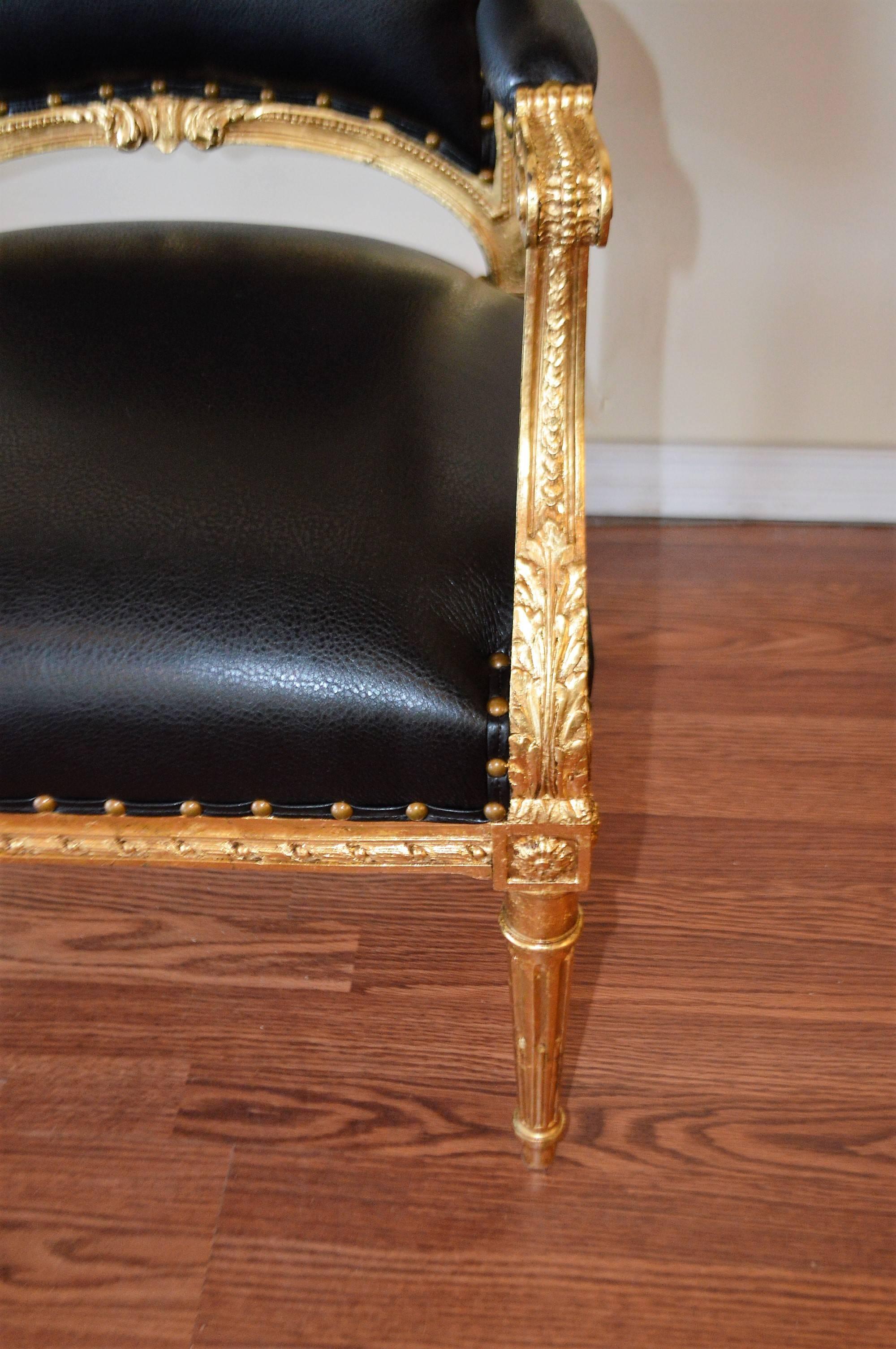 Gilt Pair of Louis XVI Style Gilded Armchairs Newly Upholstered in Black Faux Leather