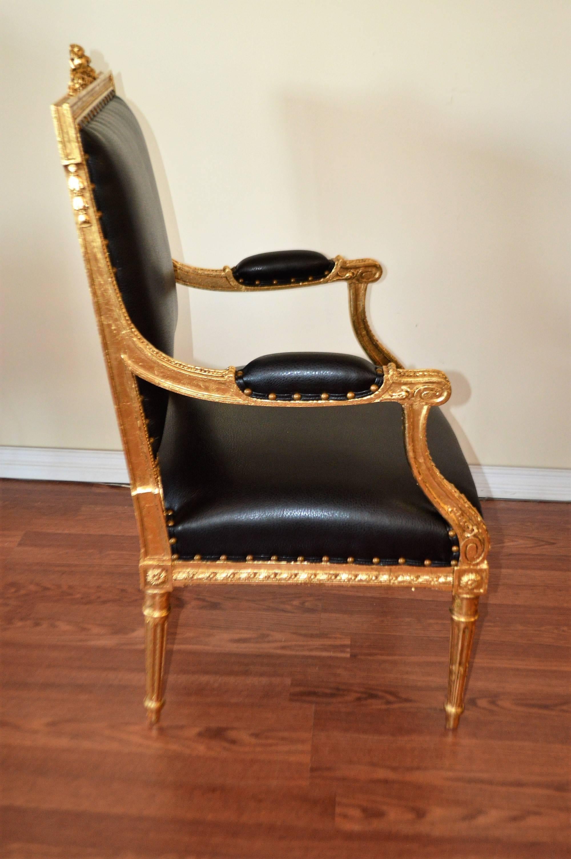 20th Century Pair of Louis XVI Style Gilded Armchairs Newly Upholstered in Black Faux Leather