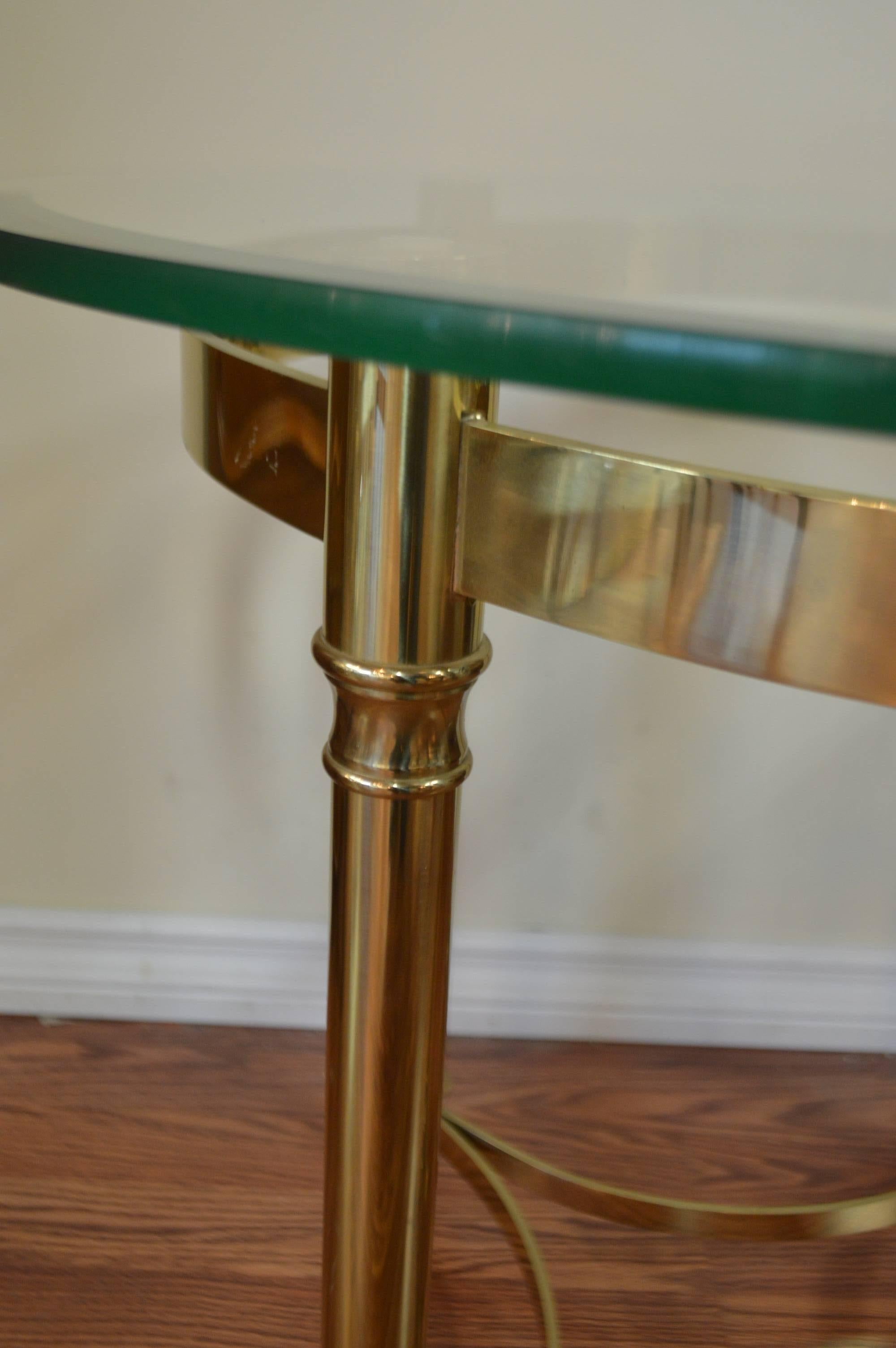 La barge, Mid-Century Modernist polished brass side table with a bevelled glass top and hoof feet.