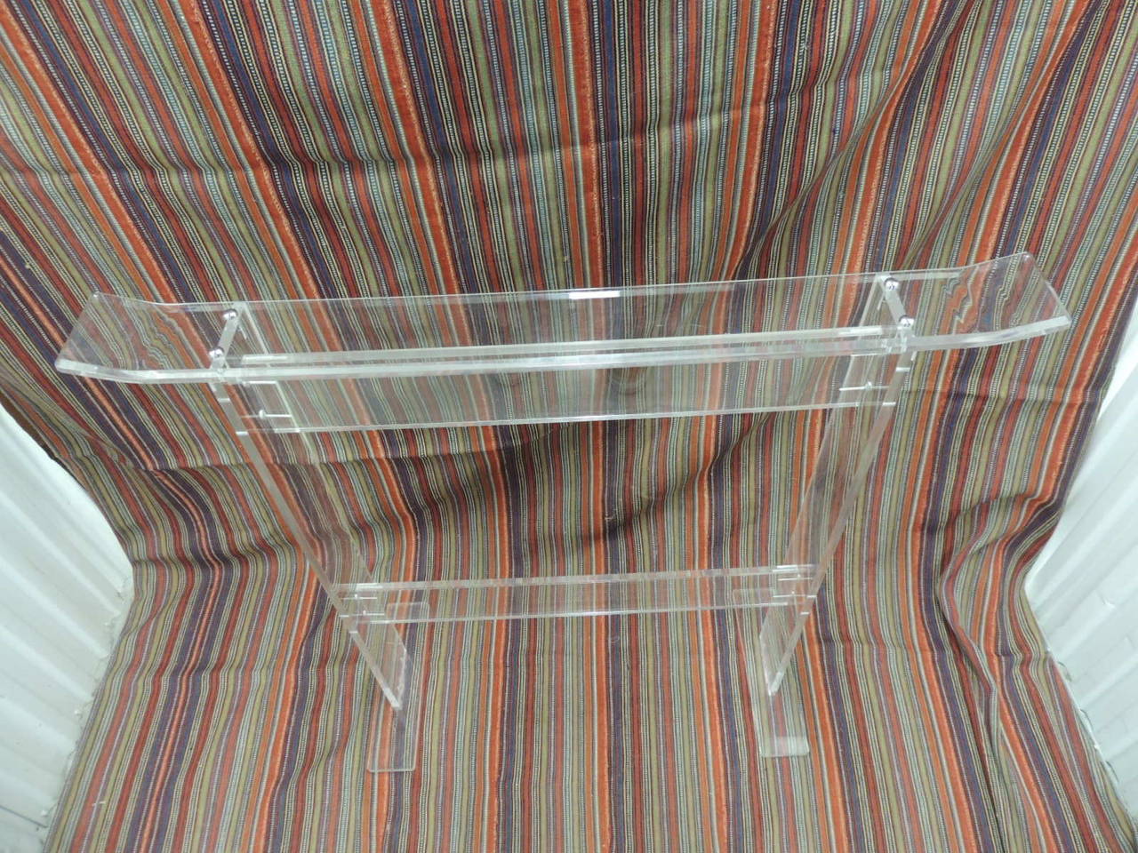 Lucite Mid-Century Modern blanket stand. Clear Plexi. The Lucite is very clear, not visible scratches, a few on the bottom under side from use. Great display or bedroom stand. Base is 12