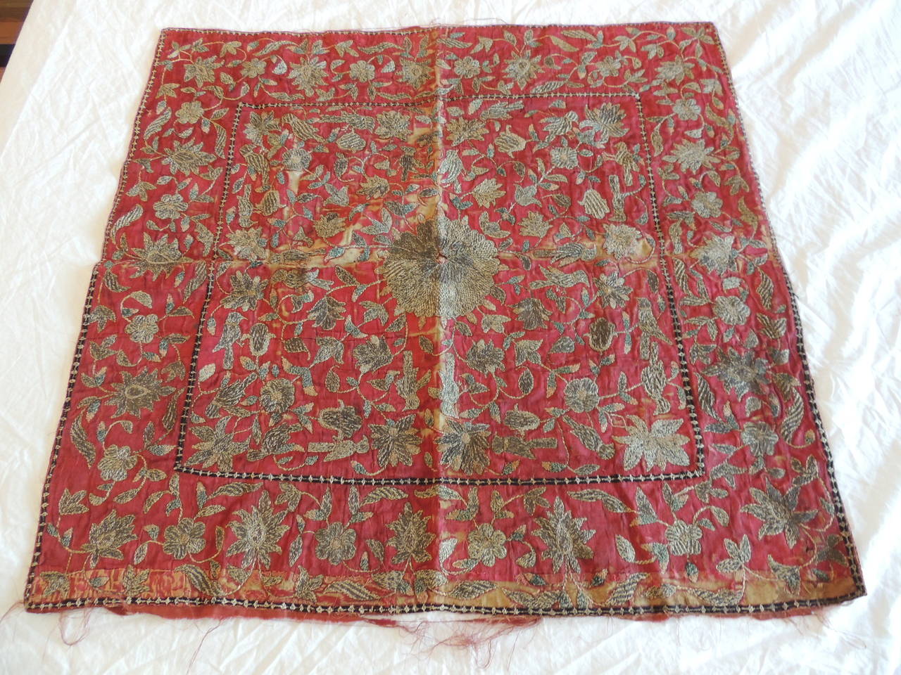 Red silk velvet with metallic threads in silver and gold. great piece for collectors of antique textiles, circa 19th century. Persian embroidery panel with faded silk velvet backing. Centre medallion motif depicting vines and flowers. Ideal for the