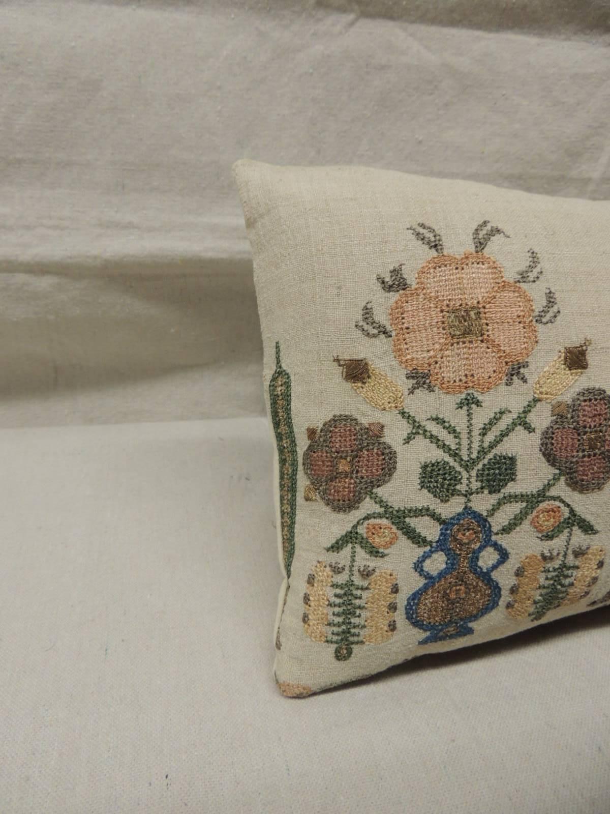 Turkish petite embroidery silk on linen pillow with metallic threads adornments.
Depicting flowers in bloom in shades of soft green, yellow, blues and pink.