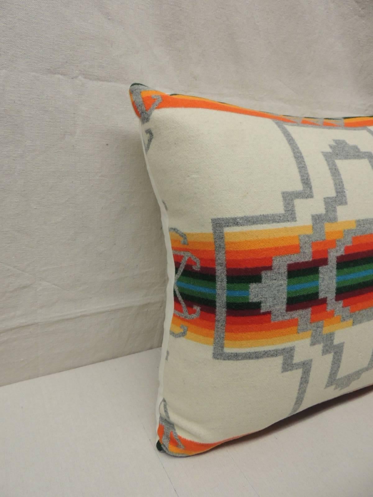 Pair of vintage Southwestern design wool pillows. Natural carriage-cloth backing.
In shades of grey, natural, orange, yellow, red, green and turquoise
Made from Pendleton blankets.
 