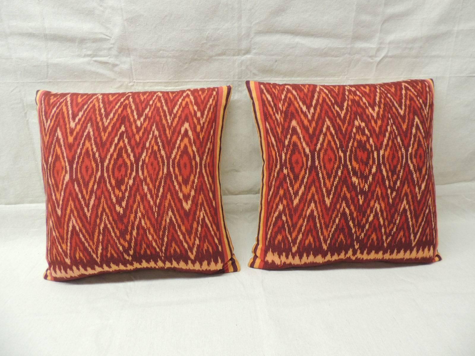 Indonesian Pair of Red and Orange Vintage Ikat Woven Pillows
