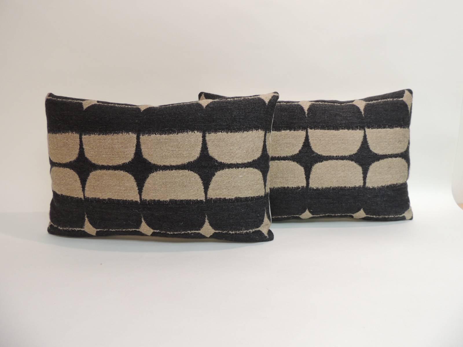 Antique Textiles Galleries...
1970s German Mid-Century Modern lumbar pillows, geometric weaved design with a natural cotton backing.  Decorative pillows handcrafted and designed in the USA. Closure by stitch (no zipper closure) with a custom-made