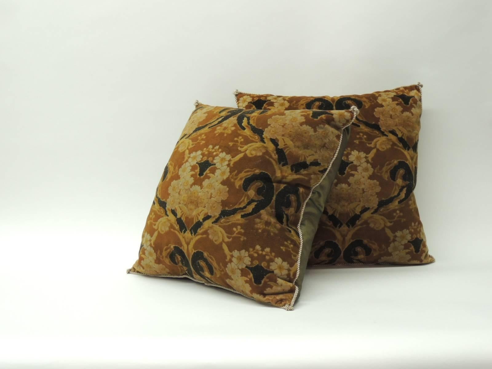 Pair of vintage Art Noveau style cotton velvet bolster decorative pillows. Art Noveau style refers to “a style of decorative art, architecture, and design prominent in western Europe and the US from about 1890 until World War I and characterized by