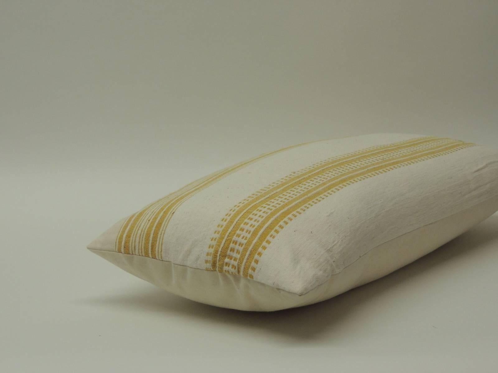 Antique Textiles Galleries...
Yellow stripes woven Turkish cotton bolster pillow in a mustard yellow textile on natural cotton with natural linen backing. The front panel of this decorative pillow is from the 1980s. Boho-chic decorative style. The