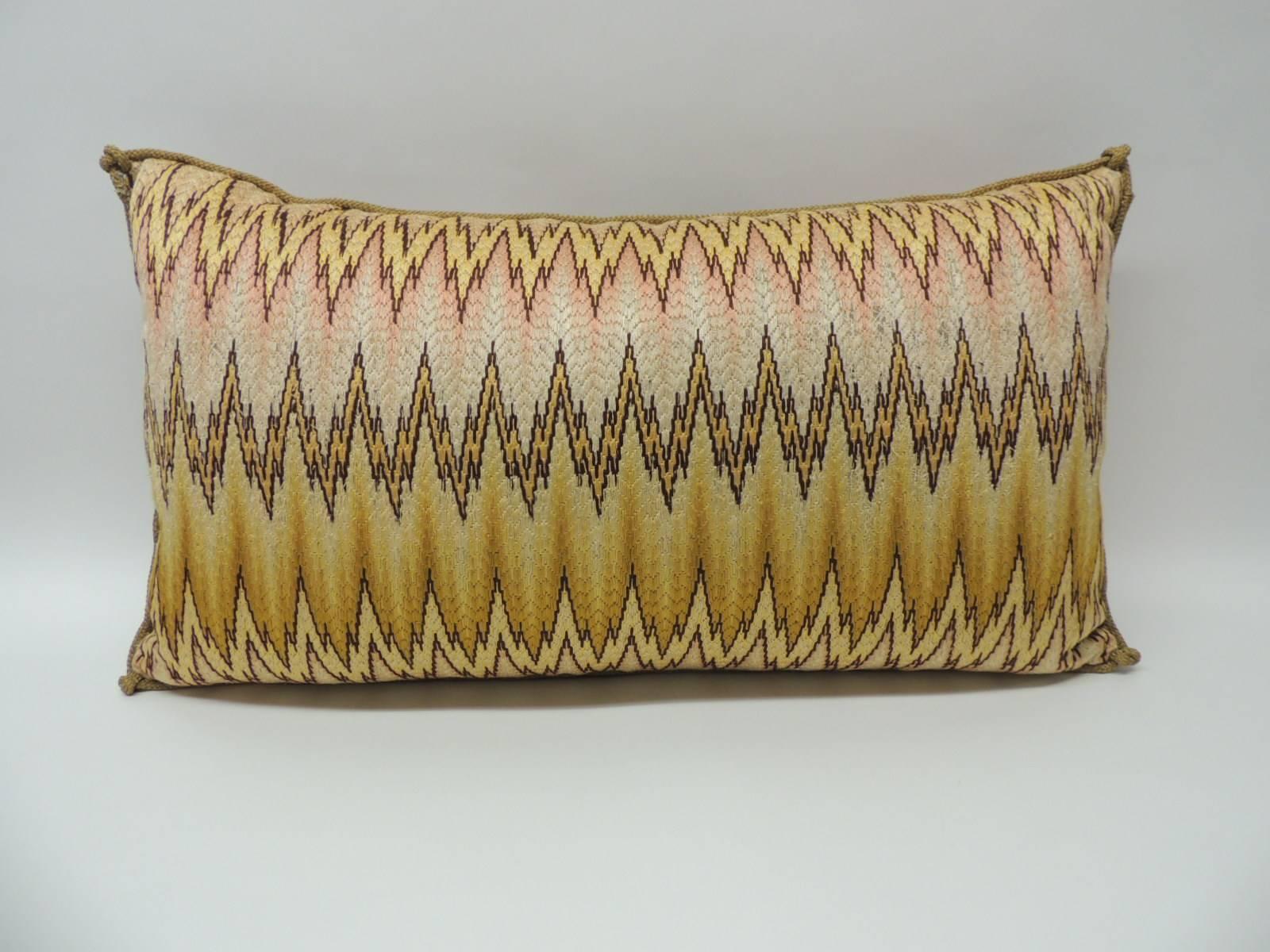 Large 19th century Italian Bargello embroidery bolster decorative pillow with antique rope trim all around: “This historic pattern originally worked in silk may be seen on 17th century chairs at the Bargello Museum in Florence, Italy.”  The large