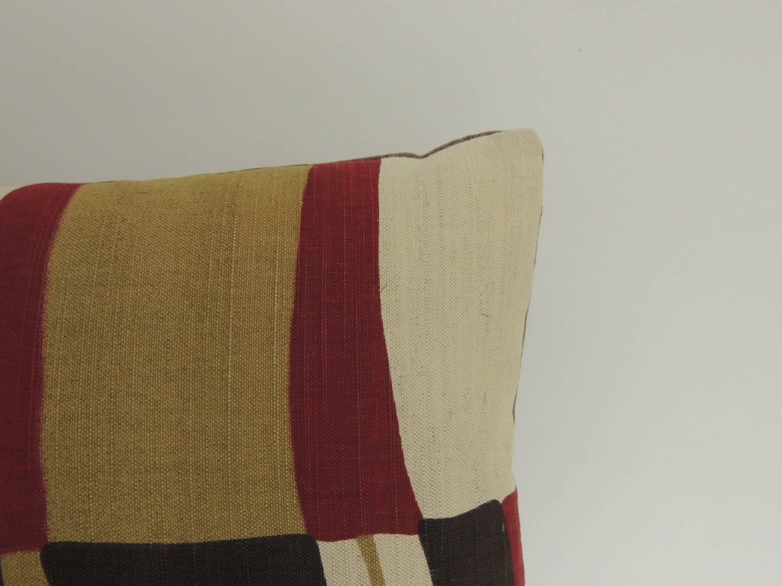 Mid-century Modern colorful bolster pillow in printed linen in shades of burgundy, mustard, black and natural with a textured brown linen backing. Made with a textile fragment from the USA 1980s. Closure: hand-stitched (no zipper) with custom made