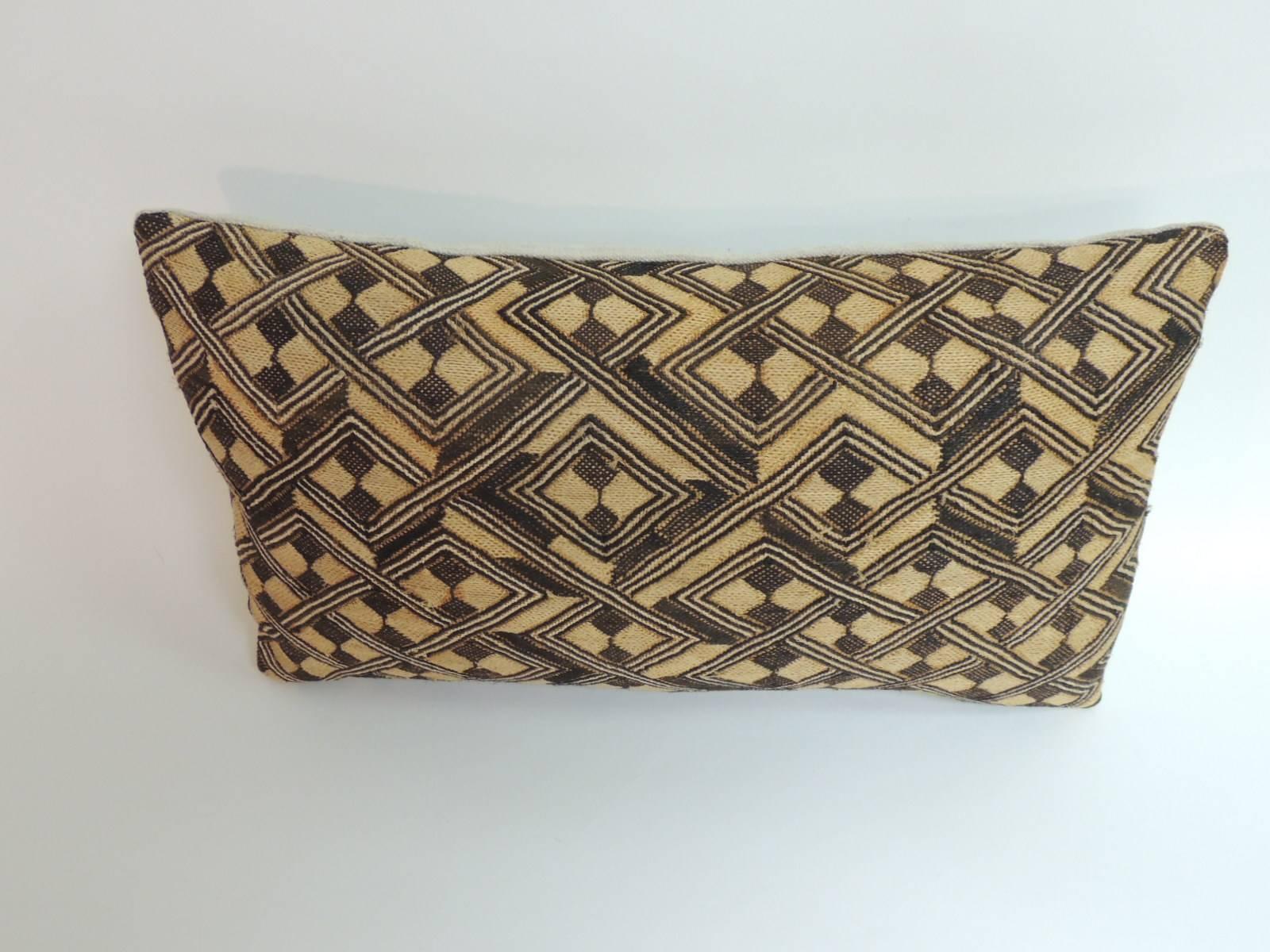 Offered by the Antique Textiles Galleries:
Vintage Handwoven orange and brown African artisanal textile decorative lumbar pillow.
Tribal woven and embroidery African lumbar pillow. Trellis and graphic diamond pattern straw cloth/raffia woven textile