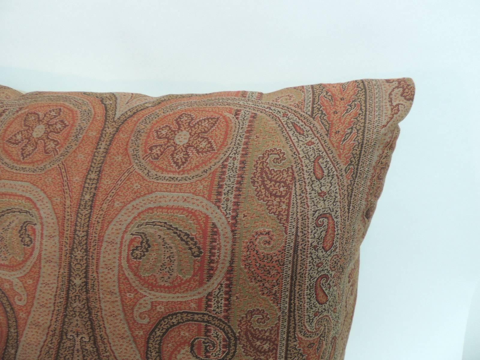 Pair of 19th century Kashmir woven paisley decorative pillows
Pair of antique textiles paisley decorative pillows with light textured linen green backings. Antique textile fragments in the front are with shades of, red, orange, green, yellow,