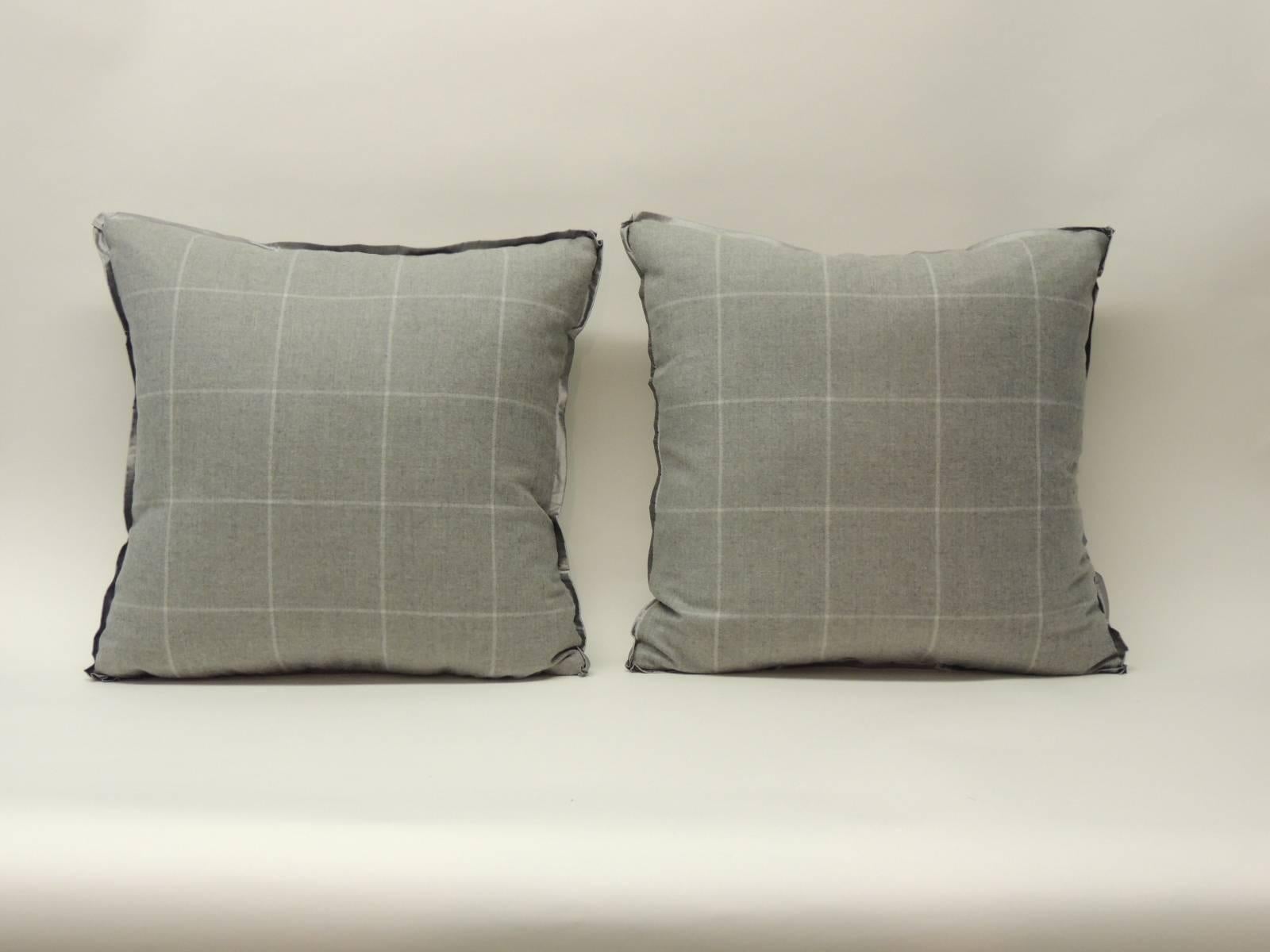 Antique Textiles Galleries:
Pair of vintage Gray Loro Piana cashmere decorative pillows with silk flat trims. The front panel is in Glen Plaid style on heather gray and has been lined for reinforcement and durability. Loro Piana website describes