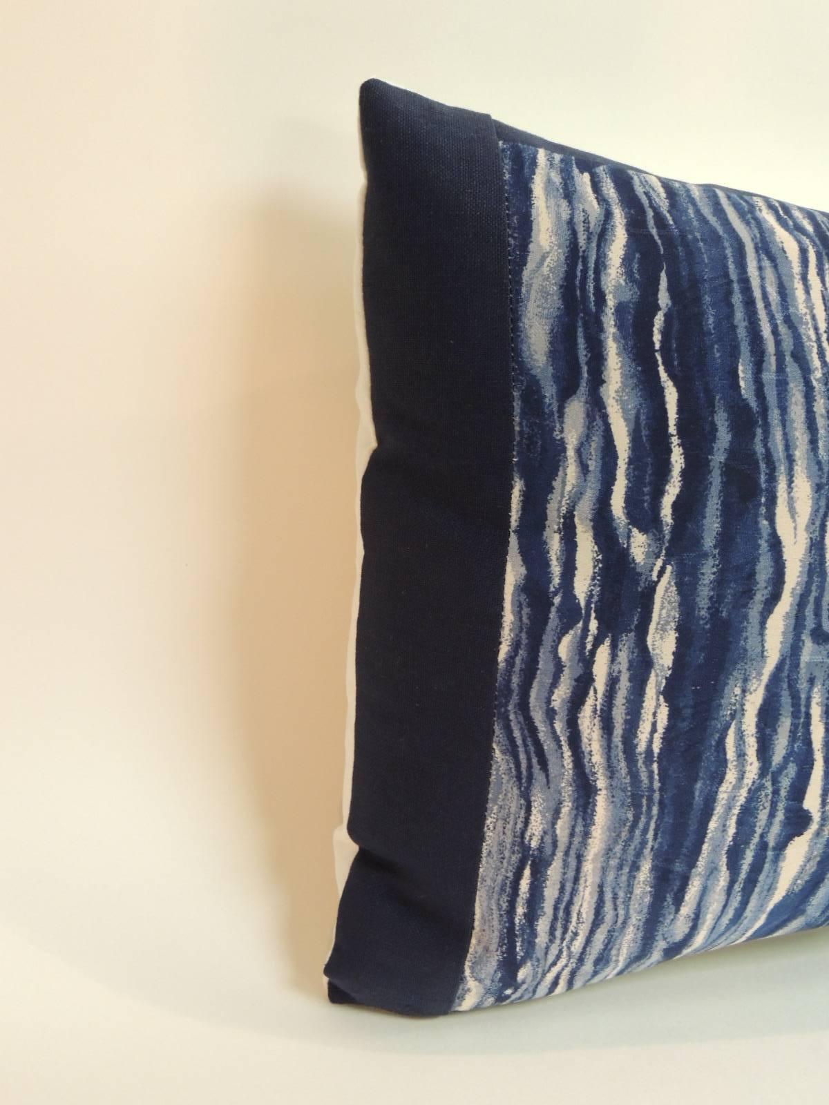 Vintage Indigo and natural Japanese Shibori silk lumbar pillow marbleized pattern in shades of indigo, blue, light blue and natural. Framed with royal blue linen and white cotton backing. handcrafted and designed in the USA. Closure by stitch (no