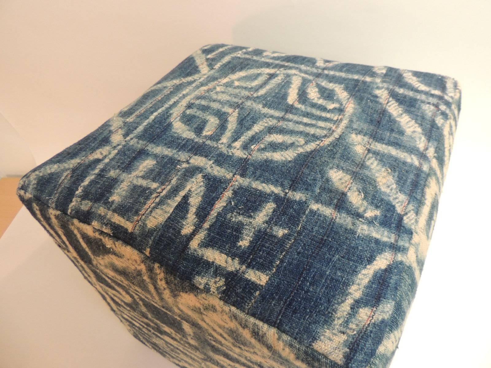 African blue and natural vintage Ndop textile upholstered square ottoman
African blue and natural vintage textile re-upholstered square ottoman custom exclusively designed by the Antique Textiles Galleries. Stripes of the African strip woven cotton