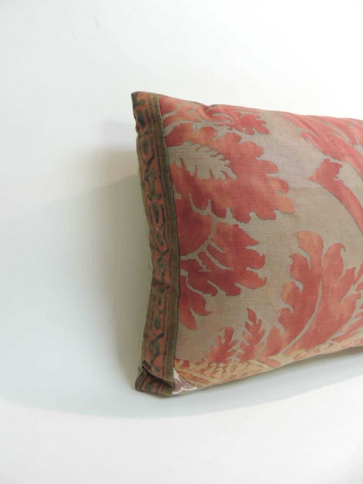 Vintage Fortuny Patchwork Lumbar decorative pillow with silk golden backing. Patchwork created from various iconic Fortuny textiles patterns and trim in shades of red. Such as De Medici, Fiaccola and Olimpia.
Decorative pillow handcrafted and